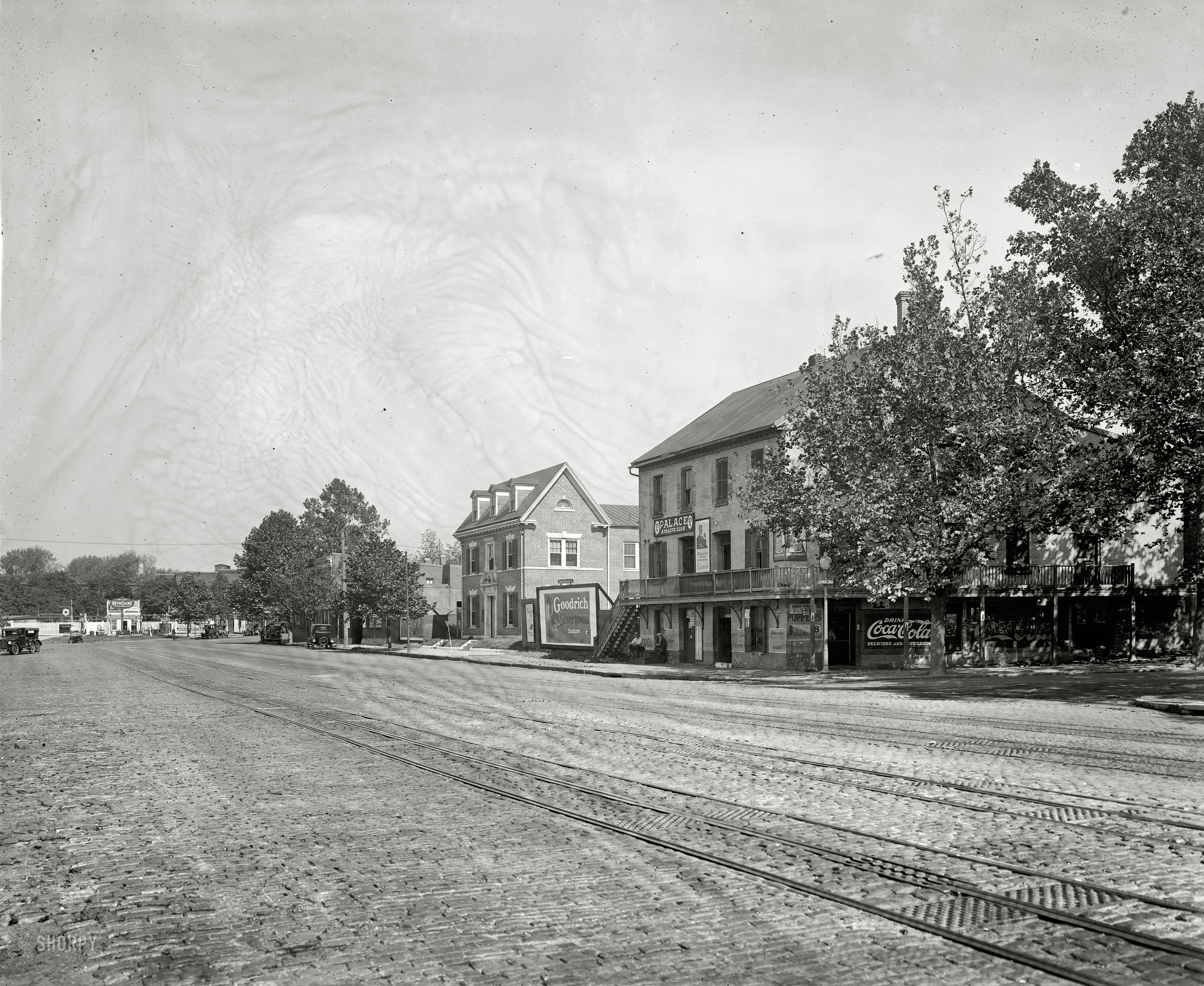 Washington circa 1927. "Harry Wardman Co. Old house, Water & M streets S.W." Lots of old signage here: Palace Athletic Club, a tire billboard, Coca-Cola, Betholine and more. National Photo Company glass negative. View full size.