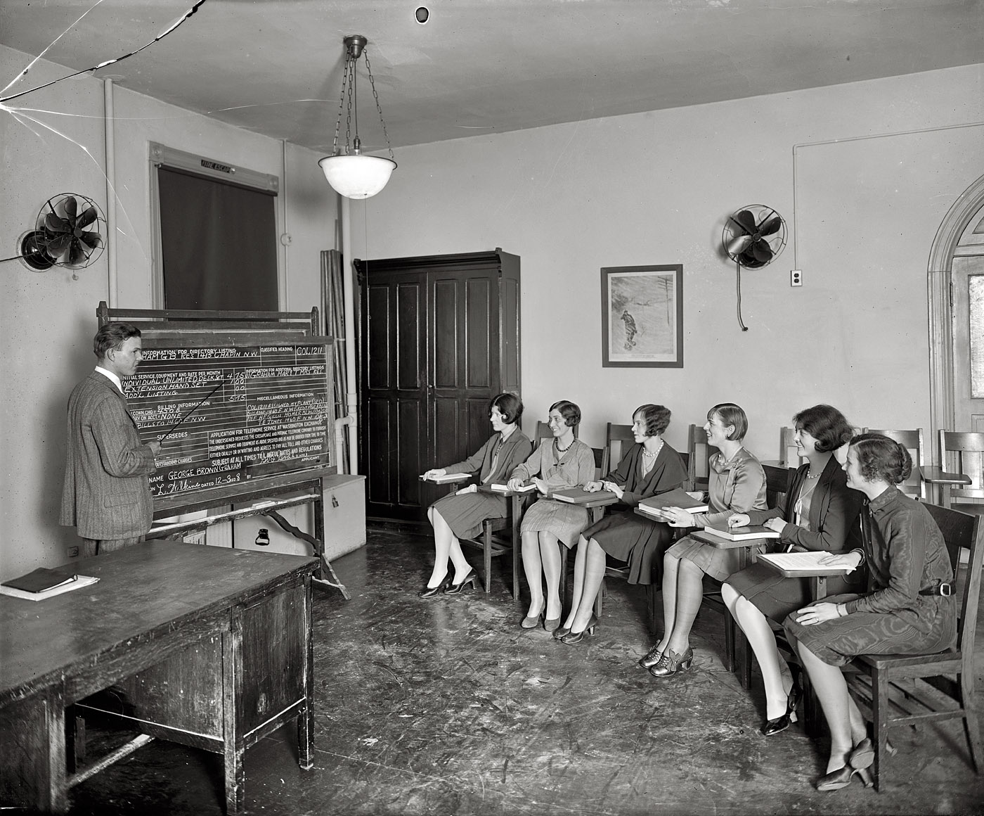 Washington, 1928. "C&P Tel. Co. girls in class laughing." Employee education at Chesapeake & Potomac Telephone. View full size. Nat'l. Photo glass negative.