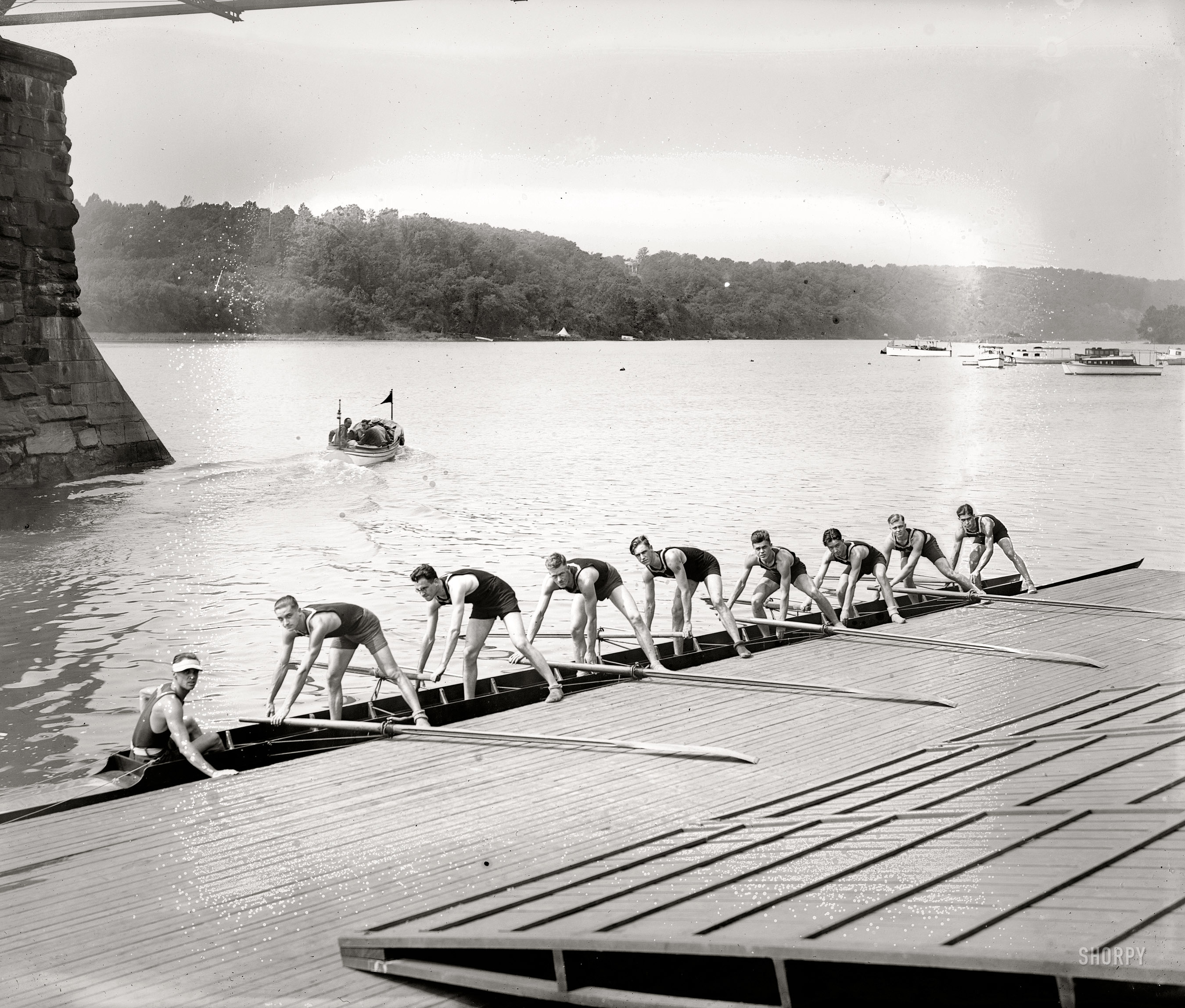 September 20, 1919. "Potomac Boat Club eight." On the river at the old Aqueduct Bridge. National Photo Company Collection glass negative. View full size.