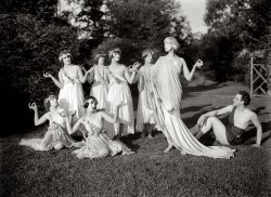 Denishawn dance company founder Ruth St. Denis and husband Ted Shawn with a smattering of vestal virgins circa 1920. View full size. G.G. Bain Collection.