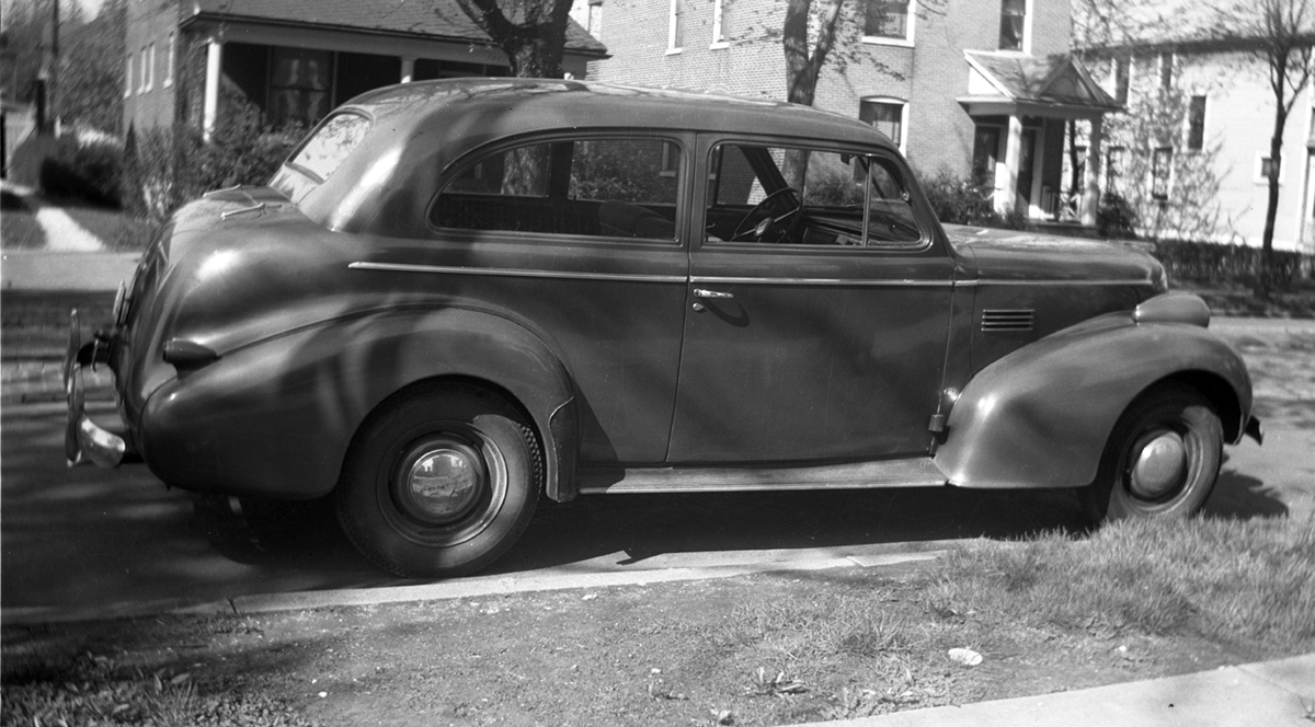 This is the car I literally grew up in, having been born in 1940. Dad and Mom kept this car until about 1949 and traded it for a '48 DeSoto. For me it was like losing one of the family. This is in front of our house in Maplewood, Missouri, about 1946. 616 Negative. View full size.