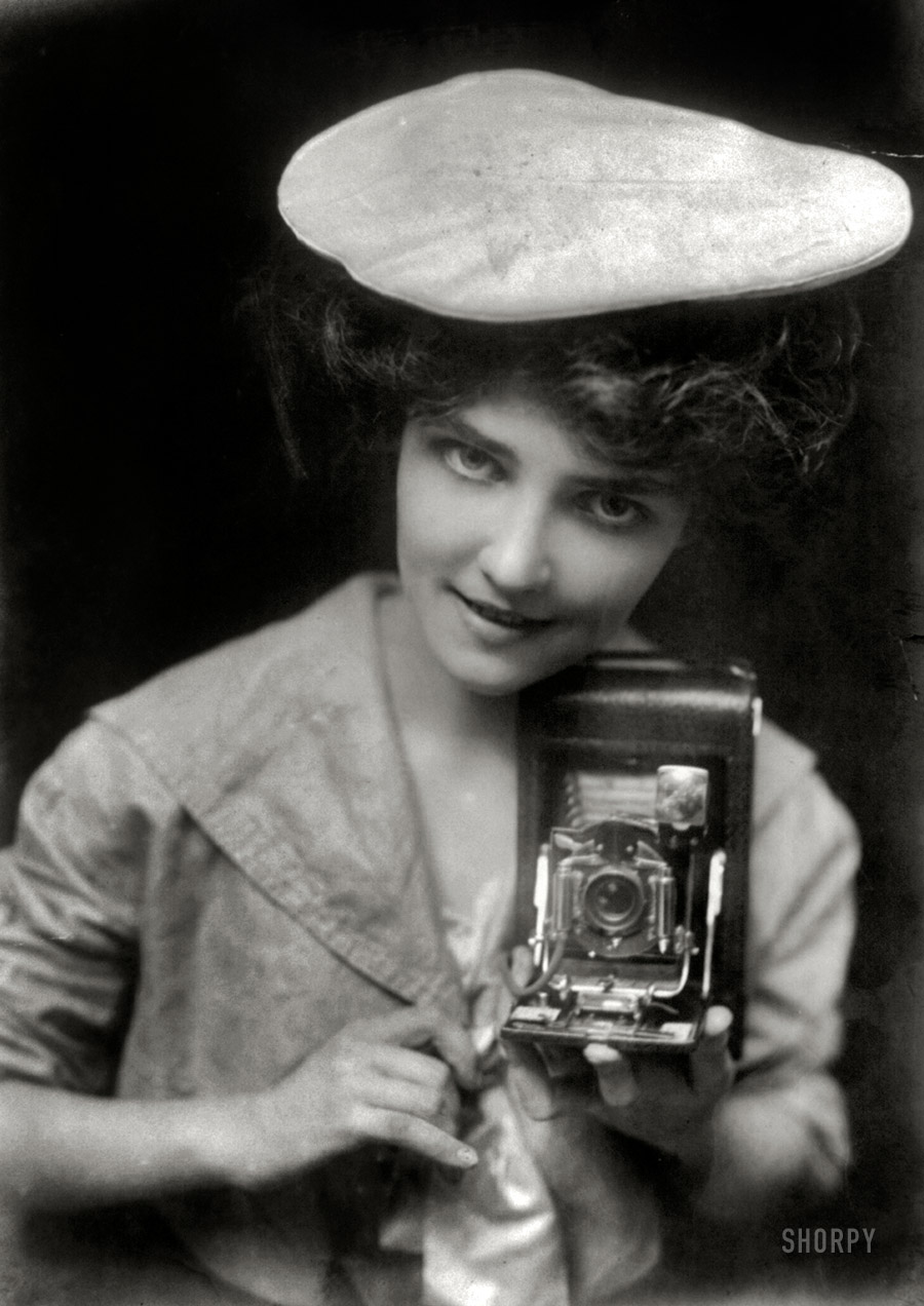 February 17, 1909. "No. 28 -- The Kodak Girl." View full size.