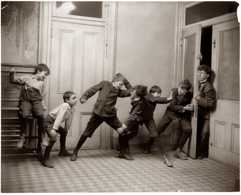 When Teacher's away, the boys will play. Posed mayhem from St. Louis photographer Fitz W. Guerin. View full size.
