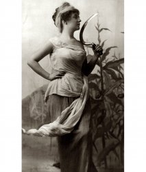 A young woman models in a studio for photographer Fitz W. Guerin. No date is recorded with the photo, but it was probably taken around 1902. View full size.