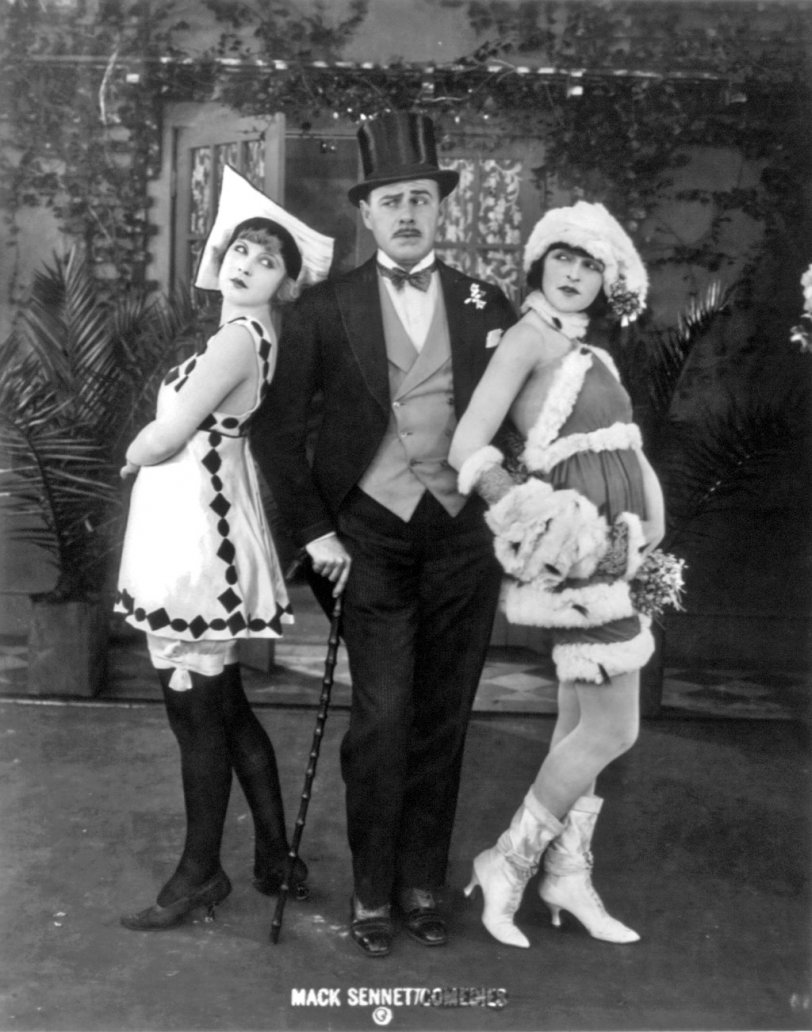 Marvel Rea (left), Ford Sterling and Alice Maison in a publicity photo for Mack Sennett Comedies, c. 1919. View full size.