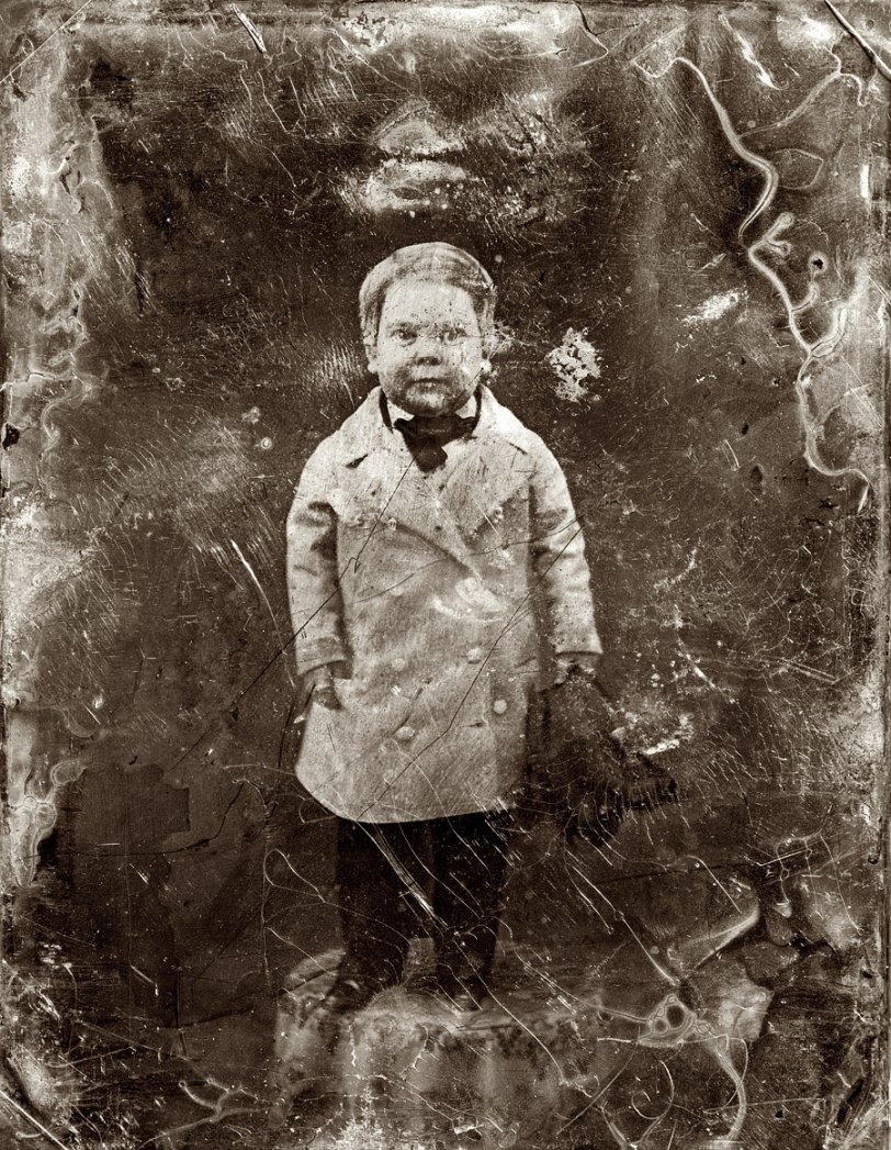 "Tom Thumb, full-length portrait, facing front, standing on table." Half-plate daguerreotype c. 1850-55 from the studio of Mathew Brady. View full size.
