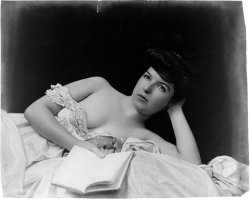 A young model lies in bed with a book. Photo by Fitz W. Guerin, between 1900 and 1903. View full size.