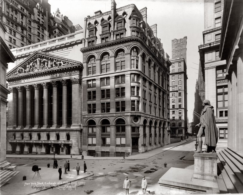 New York Stock Exchange and Wilks Building at Wall and Broad streets, 1921.  View larger. Irving Underhill photo. Note the size of the camera.
