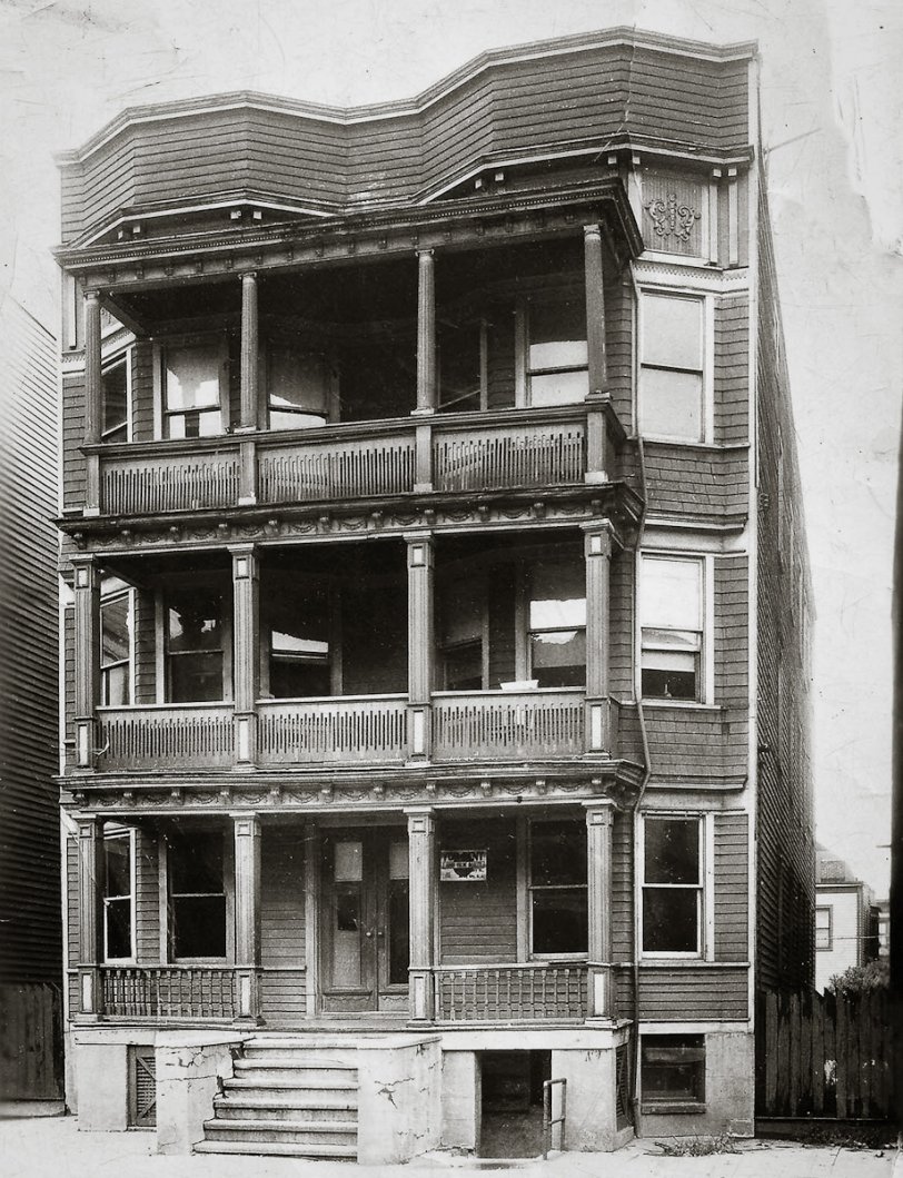 This is a 1940s photo of a 19th century three-family home in Jersey City, NJ, that my grandmother lived in. I'm unsure of the street it was on, but it may have been located on Grant Avenue. Looking at it's condition then, I assume it has been demolished. View full size.
