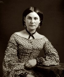 Cincinnati circa 1850s. "Unidentified woman, half length portrait, seated with arm on table." Sixth-plate daguerreotype by James Presley Ball. View full size.