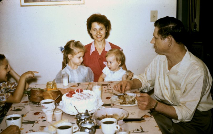 Kodachrome slide of my aunt turning one. Her cousin Sharon to the left and her Uncle Laddie to the right. My Grandma and her beautiful smile is 37 years old. Image taken June of 1959 in Chicago Illinois. View full size.
