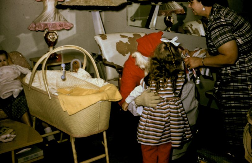 Kodachrome slide taken in December of 1958. Location is in Chicago. I know that Santa is actually my father's uncle Laddie. View full size.
