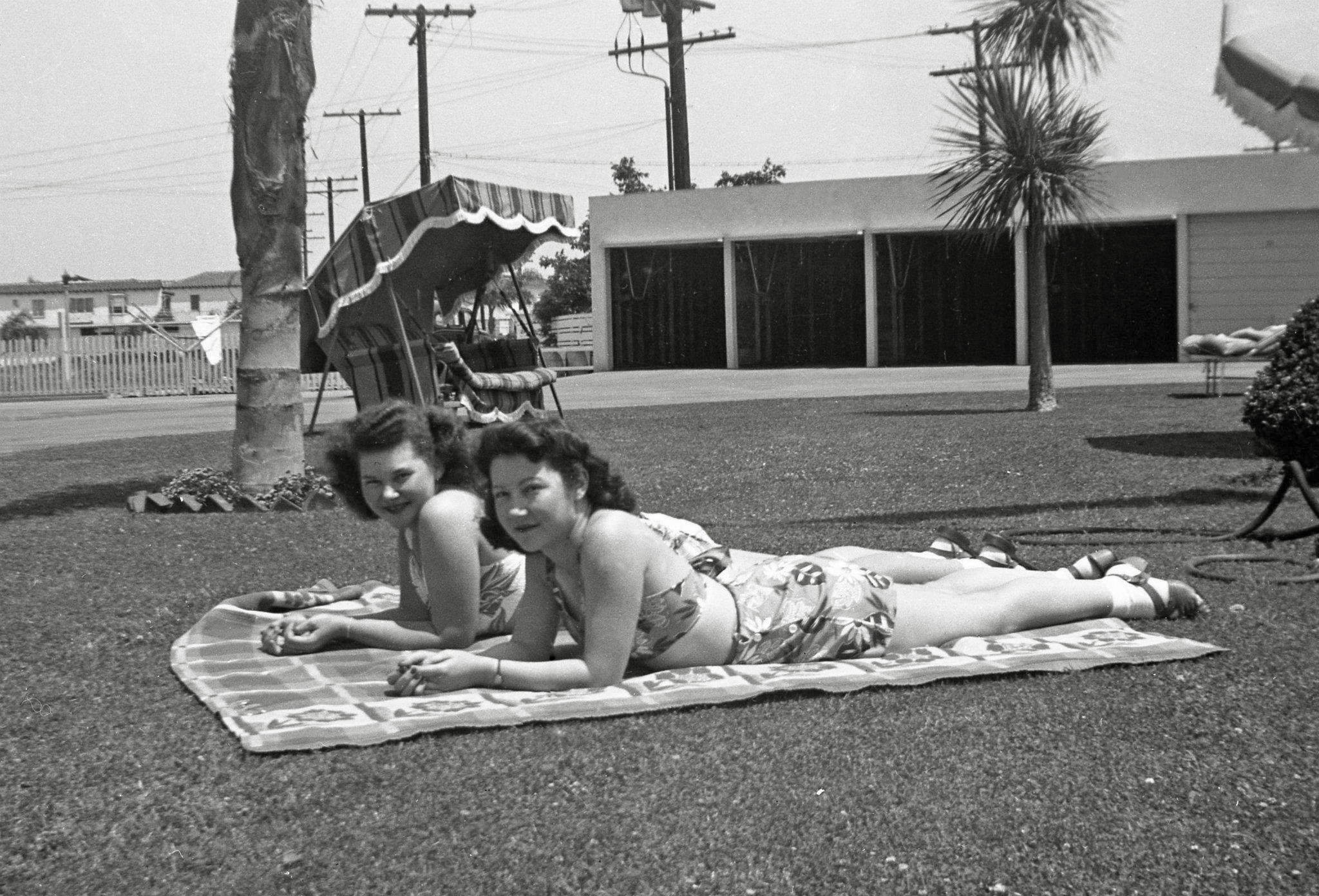 Taken somewhere near Covina, California, this is my mother-in-law and her older sister. I'm guessing it's in the early 1940s. View full size.