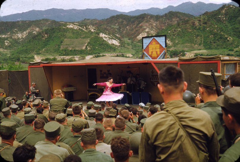 The 45th Oklahoma Division of the US Army, enjoying some entertainment late in the Korean War. This slide came from a collection I found at a local meet. View full size.
