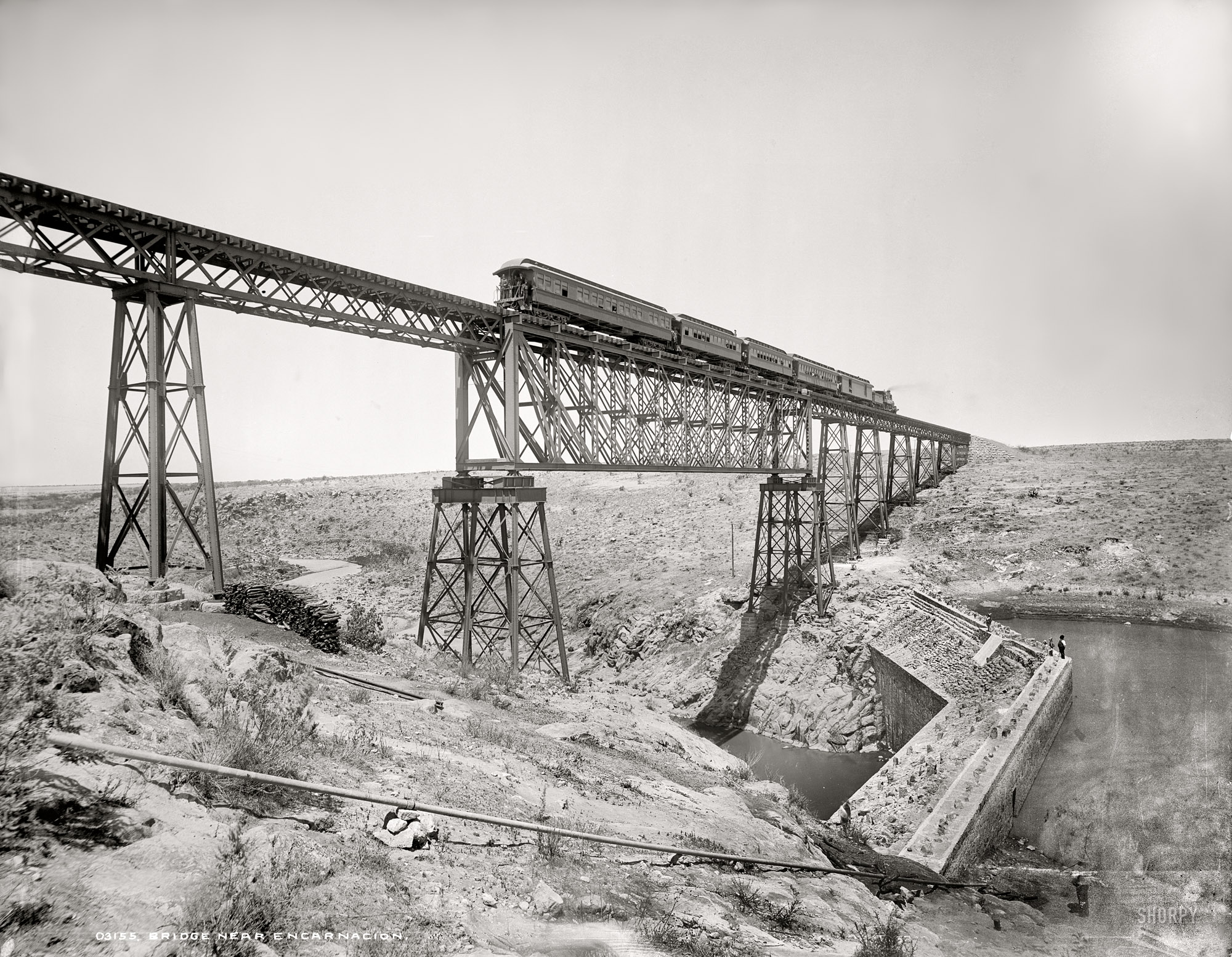 Jalisco, Mexico, circa 1891. "Bridge near Encarnacion. Ferrocarril Central Mexicano." Glass negative by William Henry Jackson. View full size.