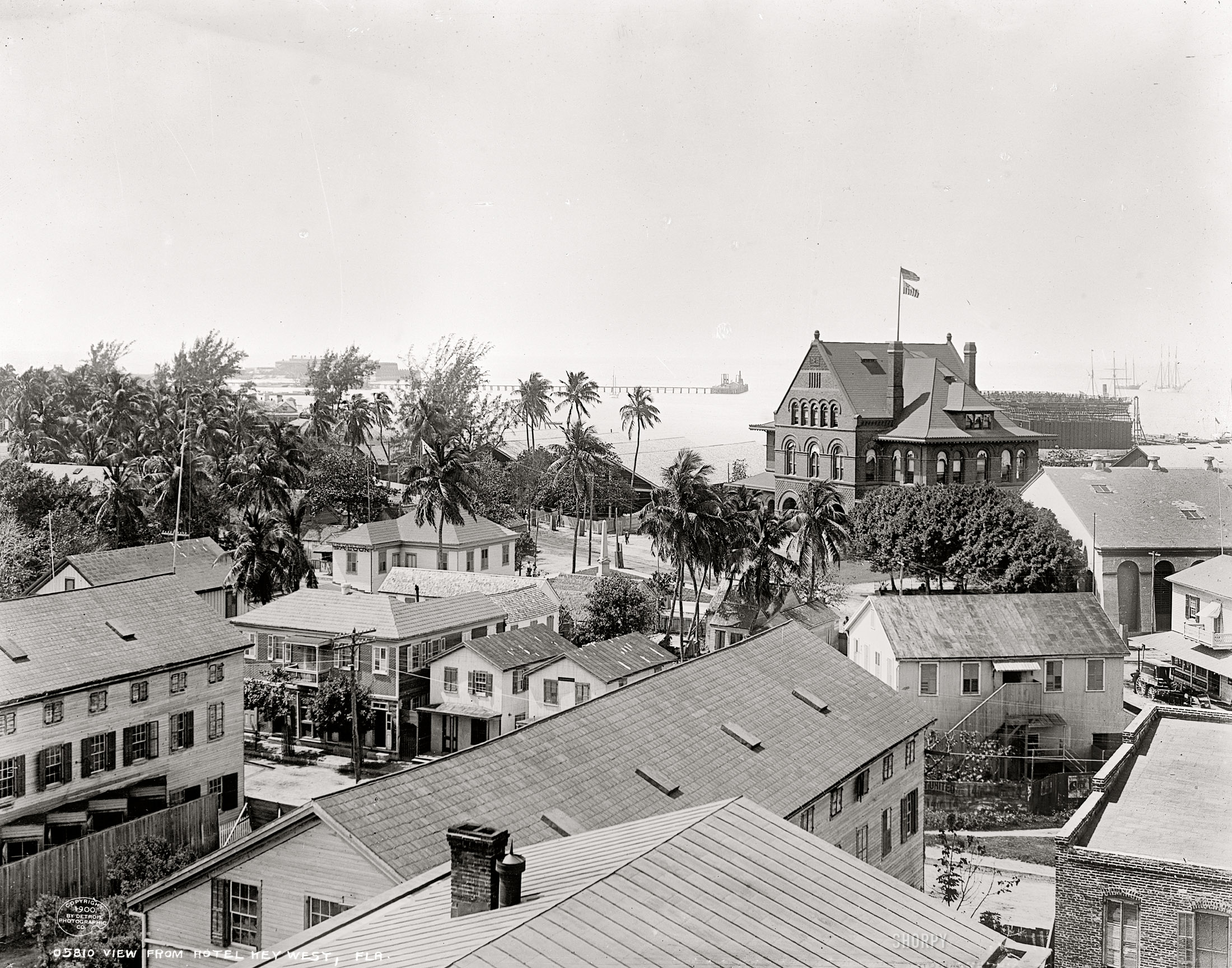 Circa 1900. "Key West, Florida. View from hotel." With nary a T-shirt or flip-flop in sight. Detroit Publishing Company dry-plate glass negative. View full size.