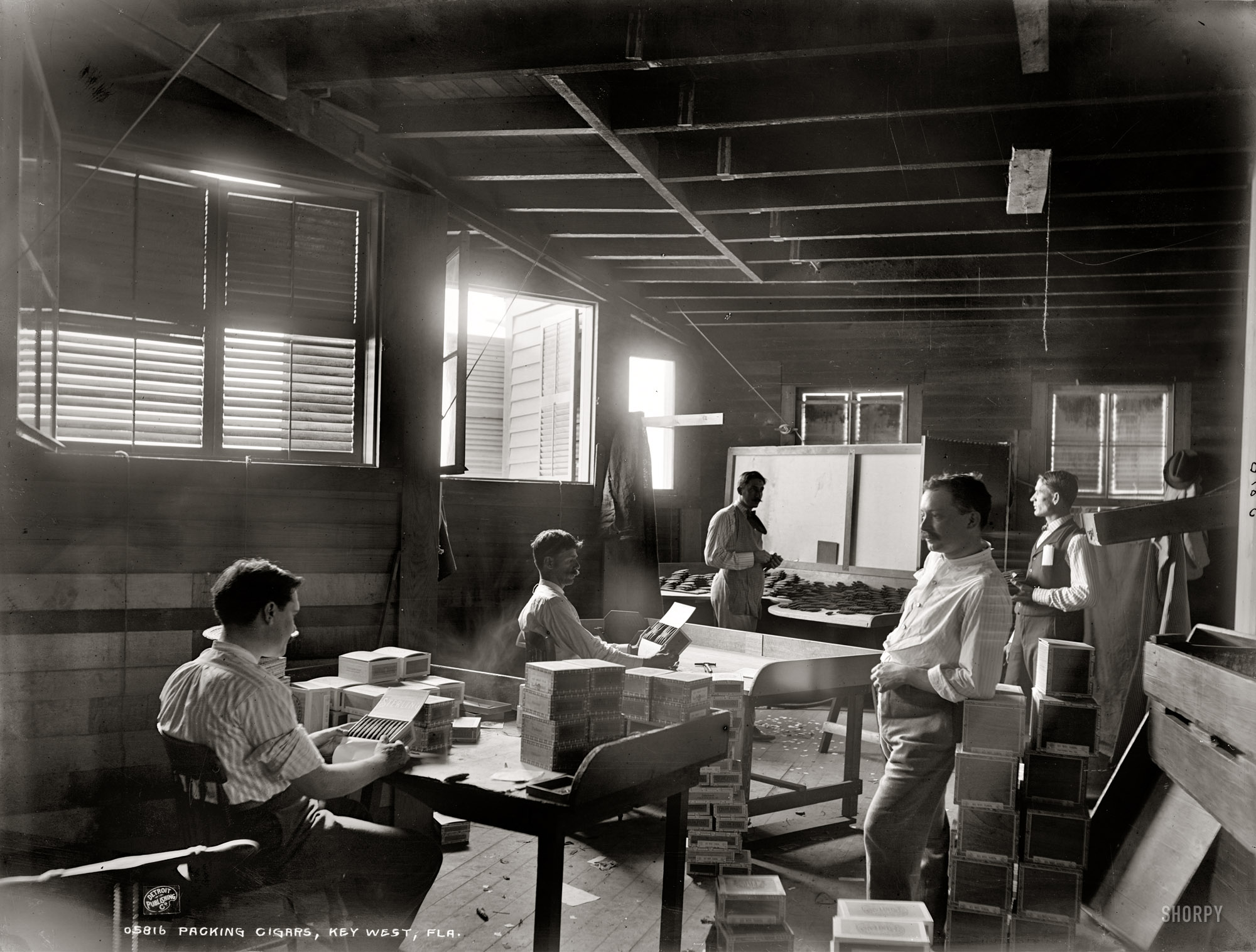 Key West, Florida, circa 1900. "Packing cigars." 8x10 inch dry plate glass negative, Detroit Publishing Company. View full size.