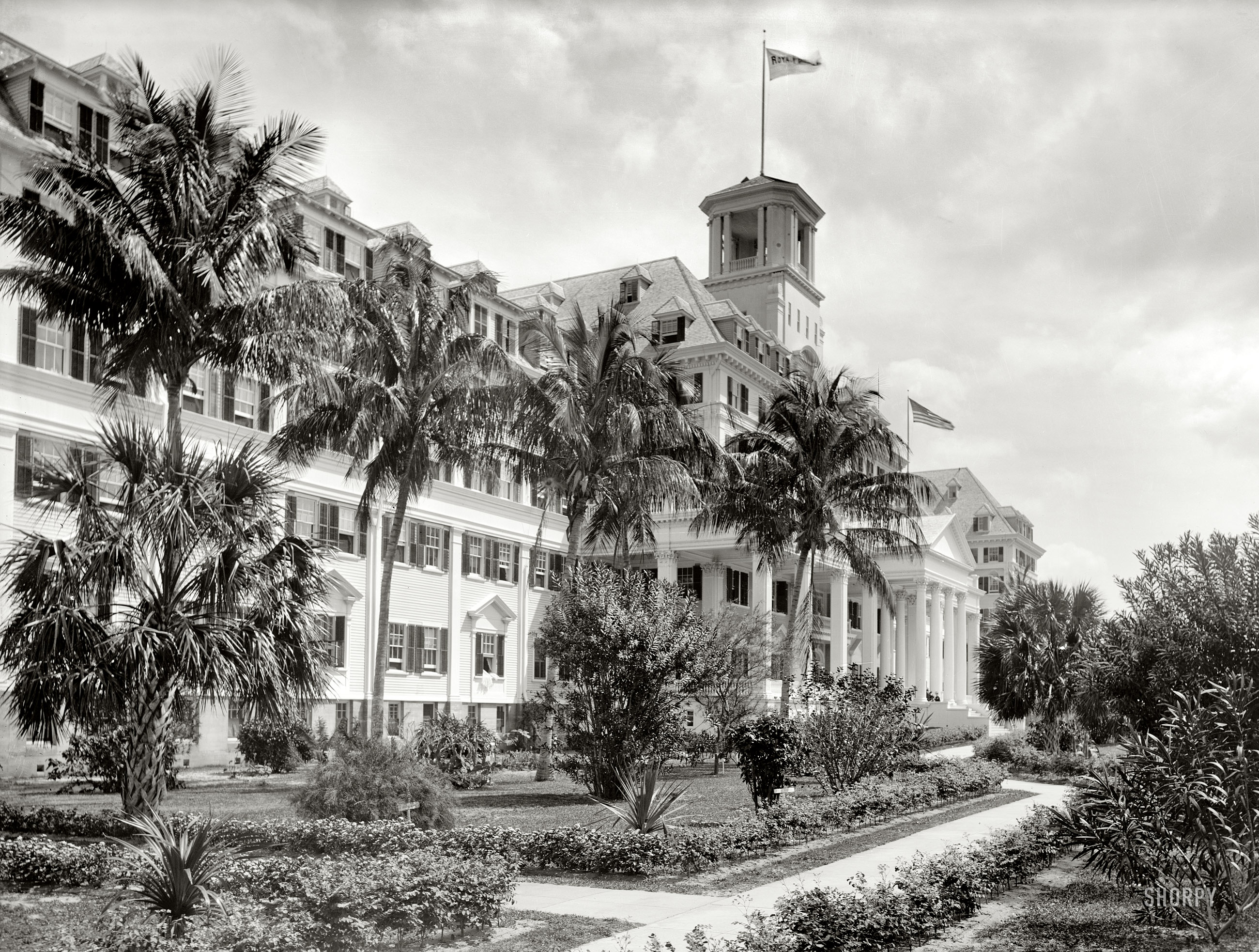 Florida circa 1900. "Hotel Royal Poinciana, Palm Beach." Shown here is the merest sliver of Henry Flagler's gigantic hotel, at one time the largest wood-frame structure in the world. Detroit Publishing glass negative. View full size.