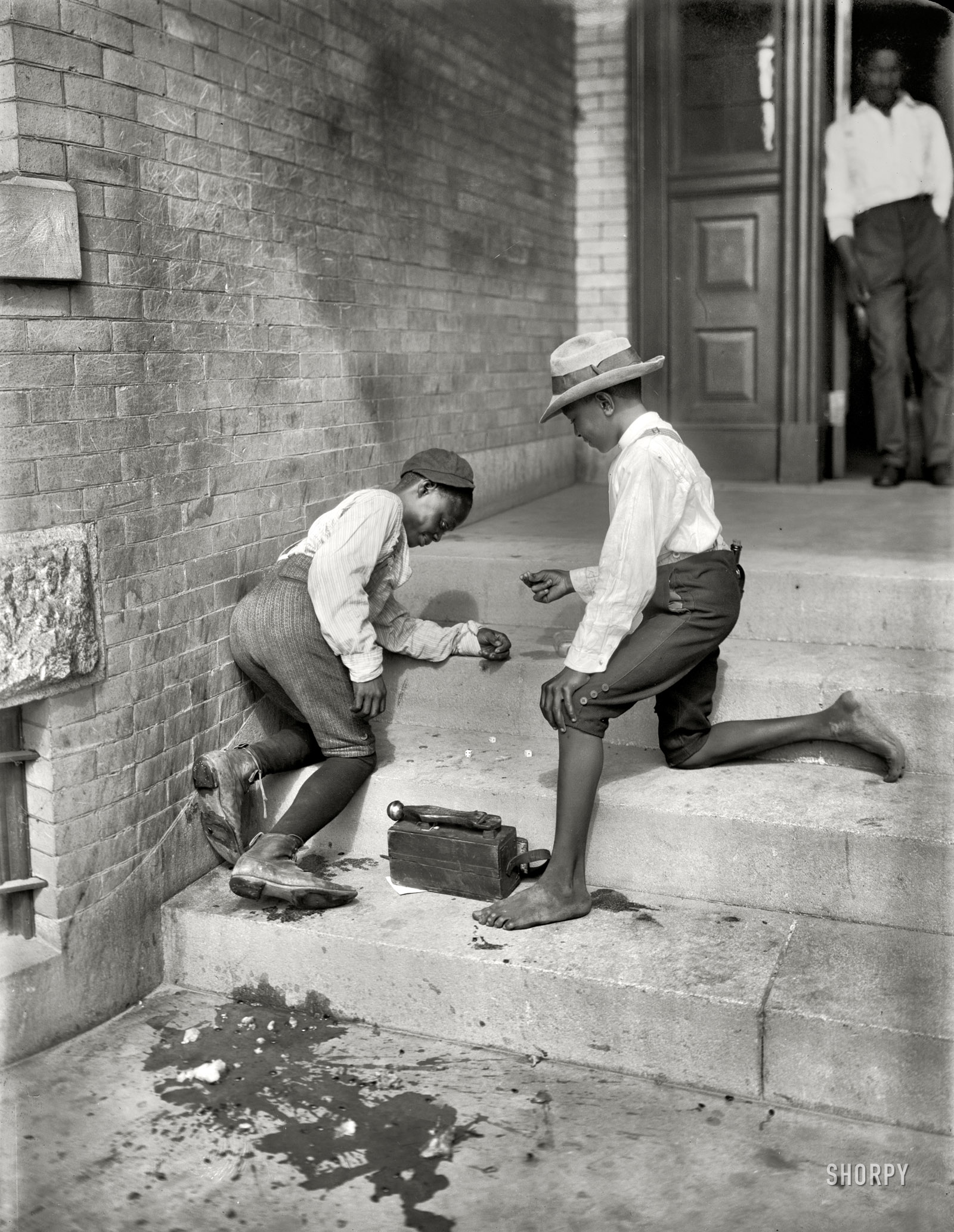 Anytown, U.S.A., circa 1901. "A quiet game." 8x10 inch dry plate glass negative, Detroit Publishing Company. View full size.