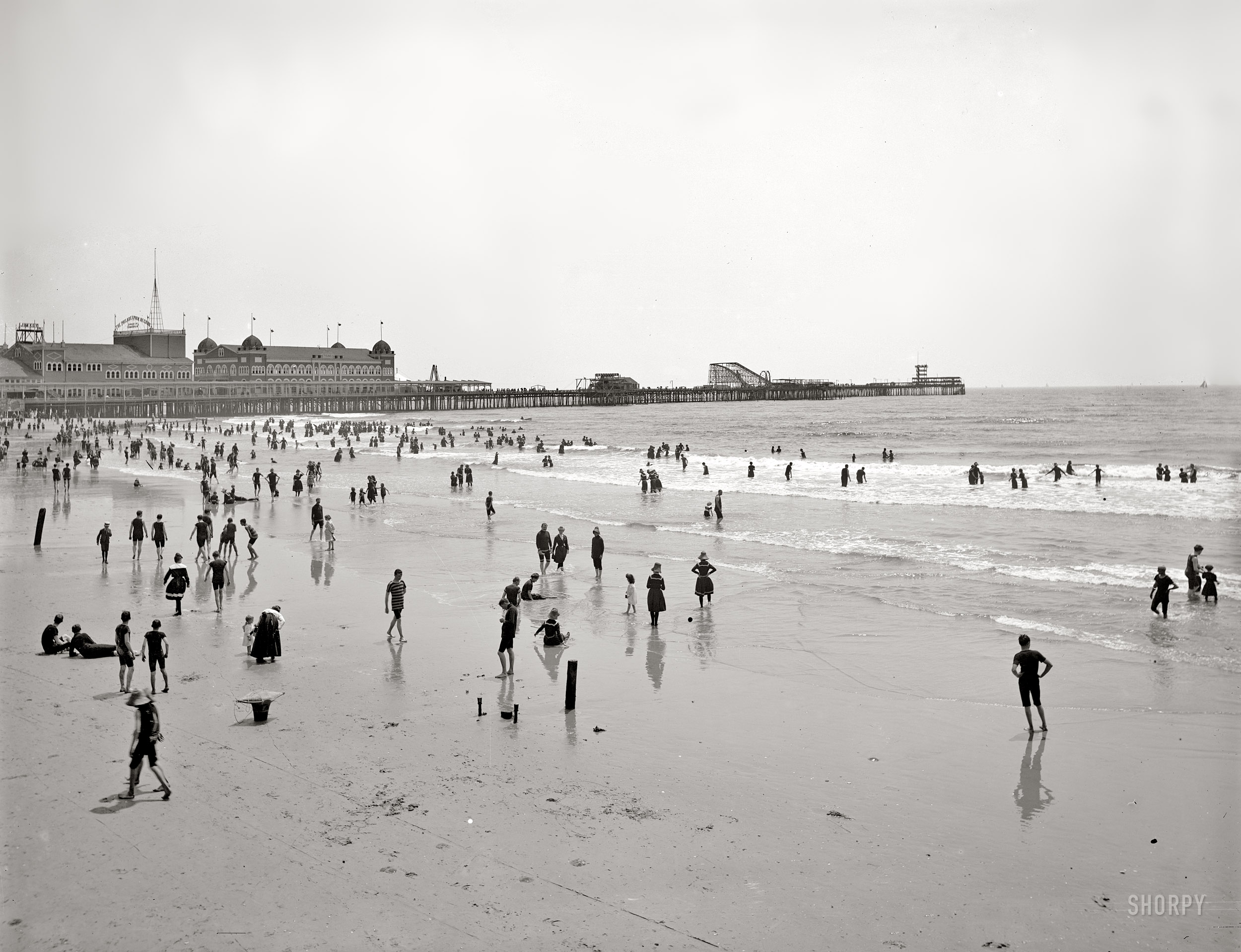 New Jersey circa 1906. "The beach, Atlantic City." The right half of a panorama formed with this image. Detroit Publishing Co. glass negative. View full size.