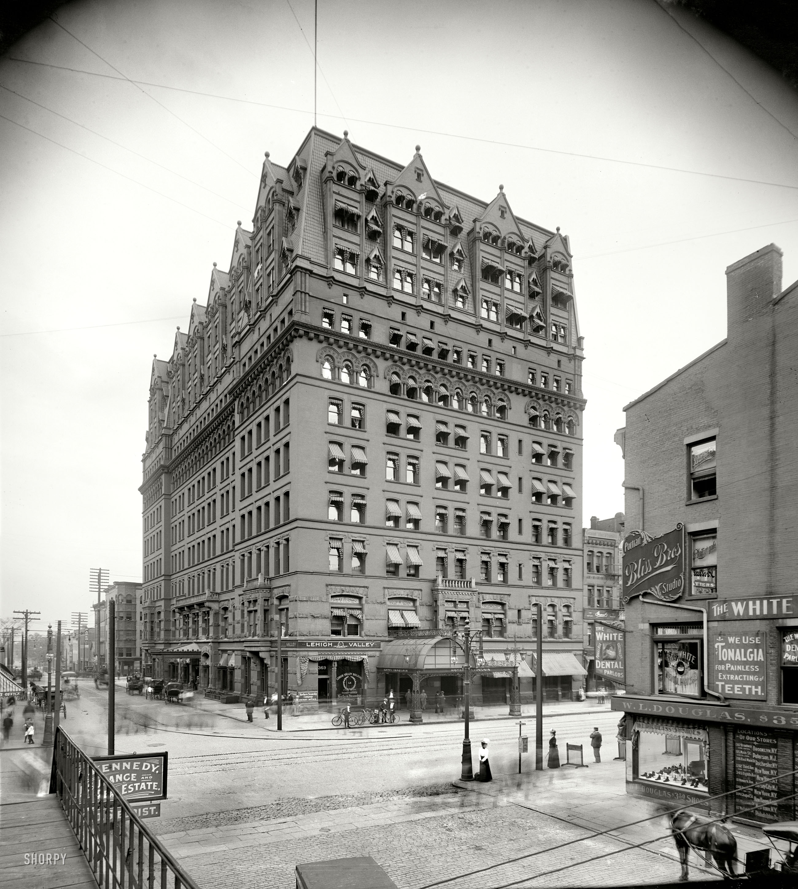 "Hotel Iroquois, Buffalo, 1900." The ectoplasmic pedestrians are out in force. 8x10 inch dry plate glass negative, Detroit Publishing Company. View full size.
