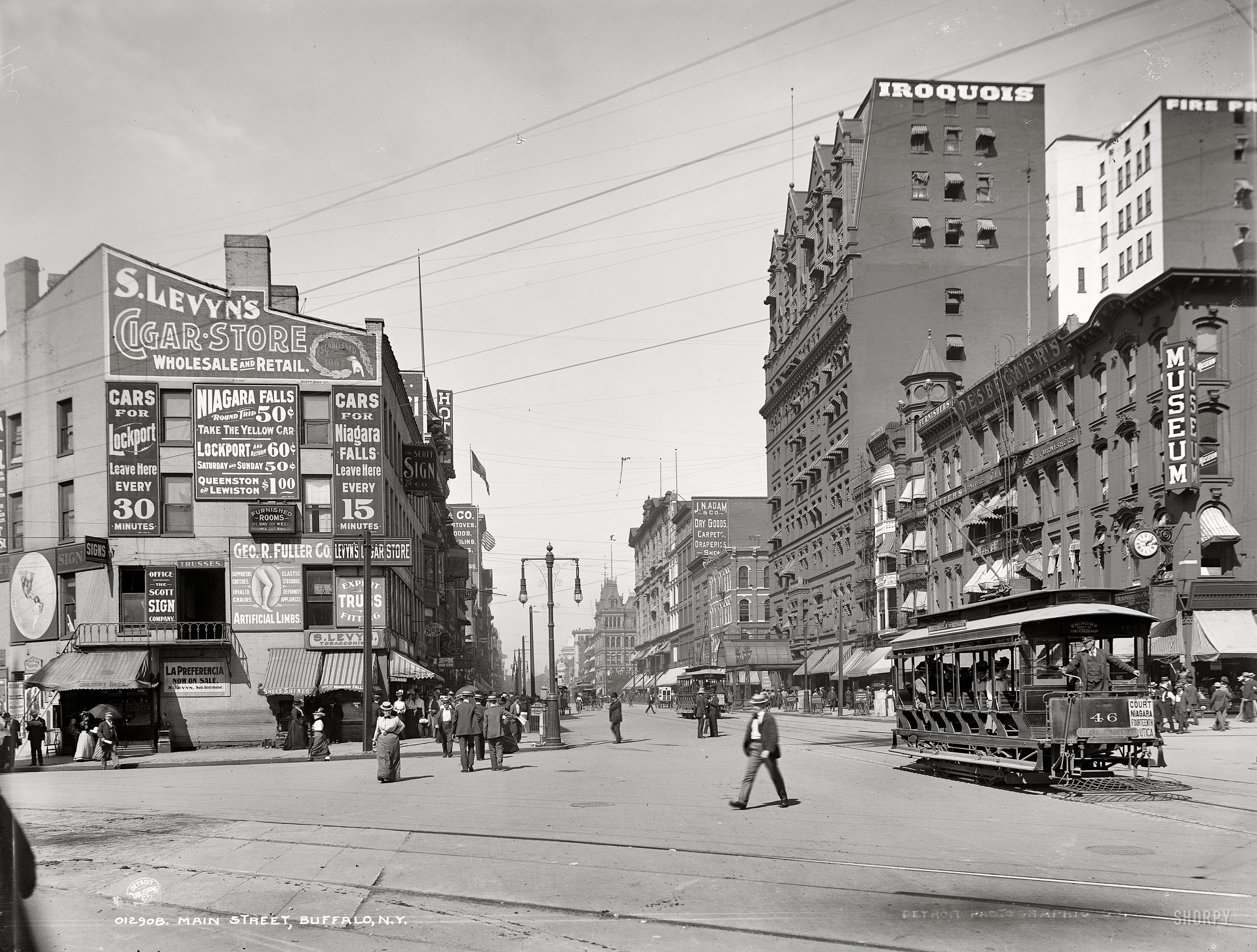 "Main Street, Buffalo, N.Y., circa 1900." The merchants of Buffalo, aside from making that fine city a haven for the herniated, also offered a wide range of "deformity appliances." Detroit Publishing Co. glass negative. View full size.