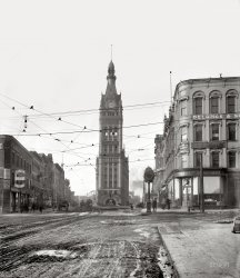 Circa 1900. "City Hall, Milwaukee, Wisconsin." Overhead, a tracery of streetcar wires. 8x10 inch dry plate glass negative, Detroit Publishing Co. View full size.