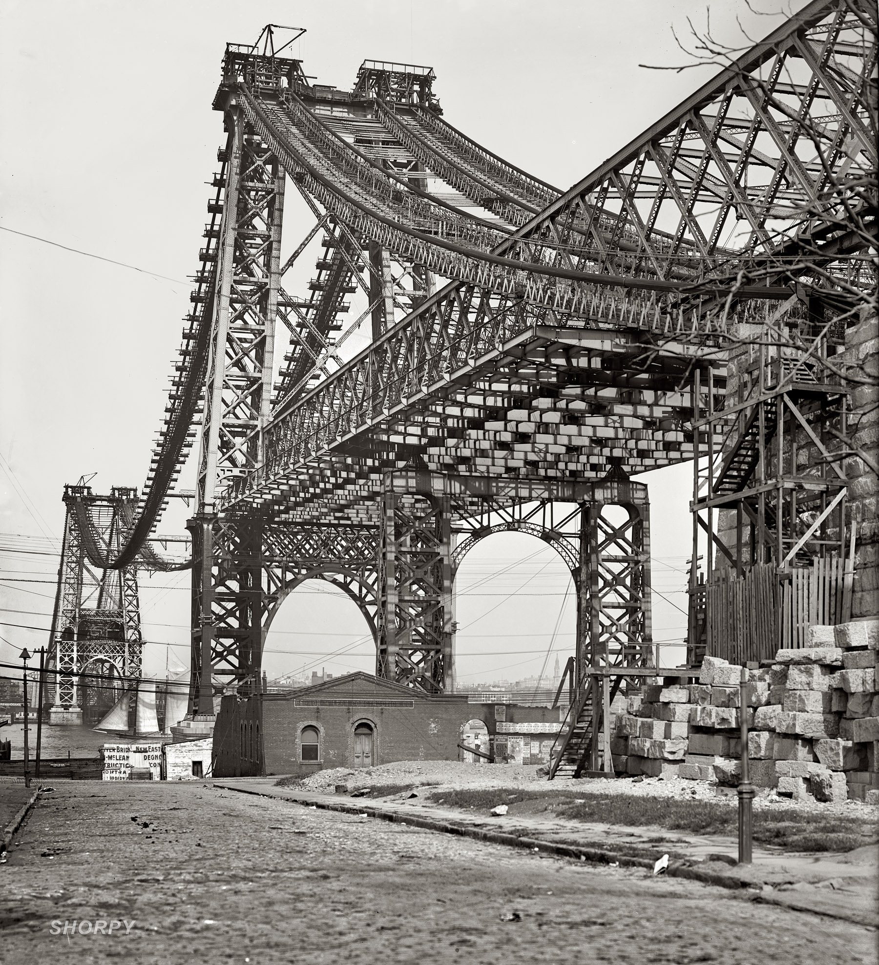 "New East River bridge from Brooklyn." The Williamsburg Bridge under construction circa 1902. Detroit Publishing Co. glass negative. View full size.
