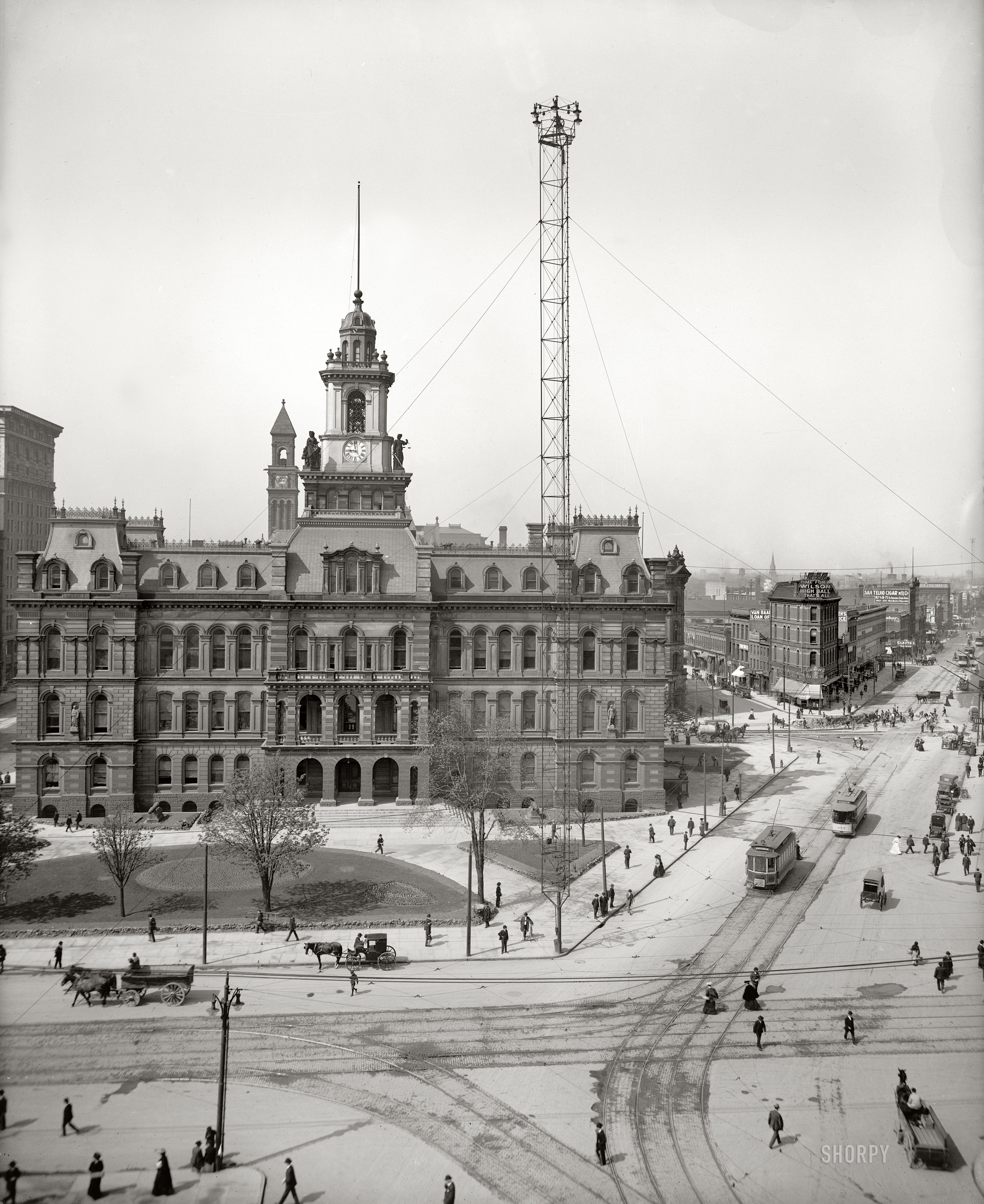 Detroit circa 1905. "The Campus Martius." This middle section of a three-part panorama features City Hall and one of Detroit's celebrated arc-lamp standards, or "moonlight towers" -- appropriately reminiscent of Wells and Verne in a plaza named after Mars. Detroit Publishing Company glass negative. View full size.