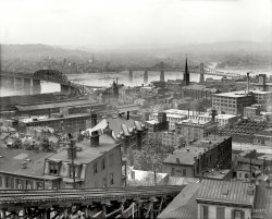 Circa 1909. "Cincinnati from Mount Adams." Bridges over the Ohio River to Kentucky and, foreground, a section of the Mount Adams Incline Railway. 8x10 inch dry plate glass negative, Detroit Publishing Company. View full size.