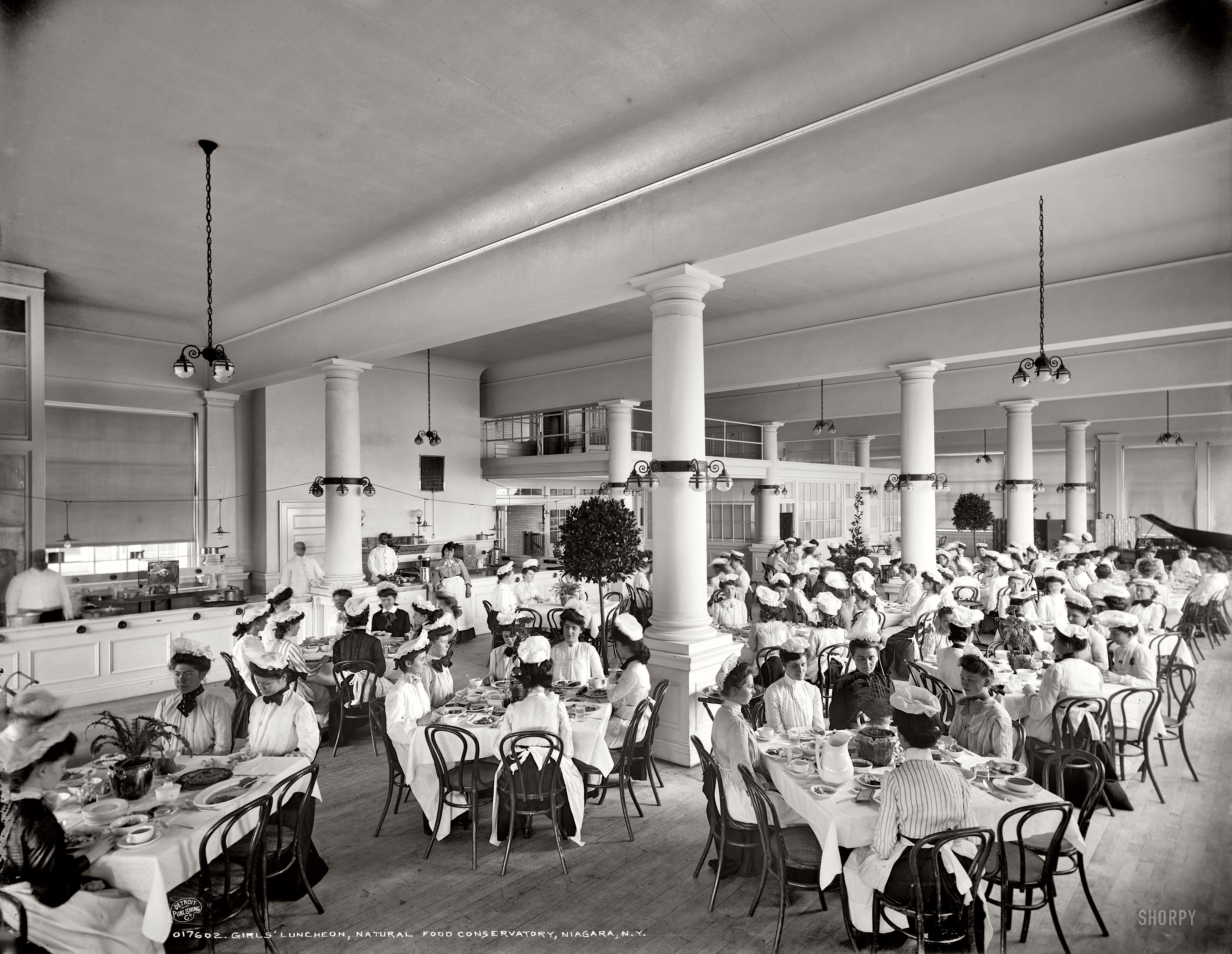 Niagara Falls, New York, circa 1906. "Girls' Luncheon, Natural Food Conservatory." Employee dining room at the Shredded Wheat factory. 8x10 inch dry plate glass negative, Detroit Publishing Company. View full size.