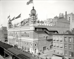 "The Hippodrome, New York. A Yankee Circus on Mars." Which was the production that opened this 5,200-seat theater, the world's largest, in April 1905. 8x10 inch dry plate glass negative, Detroit Publishing Company. View full size.
Old FlagsOne of the games we vexillologists play at our conventions is to see who can identify a folded or rolled up flag the quickest as it is being opened. Here's what I think I see for flags:
Starting from the left
1-Possibly the Chinese Dragon Flag
2-France
3-Chile
4-Can't make it out
5-Dominican Republic
6-Possibly Nicaragua (looks like the upper &amp; lower stripes are the same color)
7-Can't make it out
8-Scotland Royal Flag
9-Brazil
10-United Kingdom
11-Can't make it out
12-Can't make it out
13-Germany
14-Japan
15-Guatemala
16-Possibly Crete (blue flag with white cross, red canton with white star)
17-Ottoman Empire (Turkey)
18-Argentina
19-Persia
20-Can't make it out
21-Italy
22-A British Blue Ensign, maybe Canada, India, or South Africa; can't make out the badge. At this point in time, the Canadian Red Ensign was not yet established.
23-Can't make it out
24-Switzerland
25-Greece
26-Can't make it out
27-Possibly the Norway-Sweden Union
28-Ecuador or maybe Columbia
29-Portugal
30-United States of America
What&#039;s that smell?Strange odors plagued the 42nd Street station of the Sixth Avenue subway for years.  Engineers repeatedly checked for gas or sewer leaks, all to no avail.  Finally, sometime in the 1950's, the cause was figured out - underground deposits of elephant dung from circuses held at the nearby Hippodrome, by then gone for over a decade.
At least this is the story-- suffice to say that my patented Urban Legend Detector is flashing yellow.
Dancing girls! Elephants!From IBDB:
"A Yankee Circus on Mars" was a 4 hr. production that included 280 chorus girls, 480 soldiers, a parade of cars driven by elephants, an equestrienne ballet, acrobats, &amp; a cavalry charge through a lake.
Would have loved to gone there But it was a little before my time.
 It was between of foyty tuyd and foyty foyd street on sexth avenew.
 I think this postcard was glamorized from this photo.
The Old HippWhen I was just starting out as a stagehand in the late 60's, the oldtimers, in an effort to let us youngsters know how good we had it, would talk about "working at the Old Hipp for a Coke and a hotdog a day."
&quot;Plunging Horses&quot;I believe that it was located on the east side of Sixth Avenue between 43rd and 44th Street. Their "Plunging Horses" show must have been a precursor to the Steel Pier attraction in Atlantic City in later years.
Old flagsThere is quite an impressive array of national flags on the roof. Unfortunately, most are not furled out enough to seem them well, but besides the US flag, I think I can see ones that are unchanged since then: France (very left), possibly Japan and Mexico (adjacent to each other, middle section), and the Ottoman Empire (the crescent and star, very similar to the flag of modern Turkey).
More interestingly, there are also flags no longer used: The rightmost flag on the front looks like the Kingdom of Italy (the modern tricolor plus an added shield in the middle). Two places to the left of that, with a lion holding a sword against a sun, is an old flag of Iran.
The horizontal tricolor in the middle of the front may be either the Netherlands (red on white on blue) or the German Empire (black on white on red).
There seem to be various British commonwealth flags as well, but I can't quite tell which. The UK flag itself seems strangely absent
I'd be interested if people figure out some of the others.
Toilets fixedBy the famous plunging horses.
On The TownCHIP:
My father told me, "Chip, my boy,
There'll come a time when you leave home;
If you should ever hit New York,
Be sure to see the Hippodrome."
HILDY:
The Hippodrome?
CHIP:
The Hippodrome.
HILDY:
Did I hear right?
Did you say the Hippodrome?
CHIP:
Yes, you heard right.
Yes, I said the Hip-
(Hildy brakes.)
Hey what did you stop for?
HILDY:
It ain't there anymore.
Aida sang an "A"
And blew the place away!
What&#039;s in a nameI remember a multi-story parking lot at the NE corner of Sixth Avenue and 43rd Street called the Hippodrome. I always wondered about the name, but never in a million years would I have guessed there was a magnificent 5,200 seat theater on the site before that! Unbelievable! Thanks, Shorpy.
Another landmarkDid anyone notice the Algonquin Hotel in the background?  Isn't it the oldest continuously operating hotel in the city?
(The Gallery, DPC, NYC, Railroads)