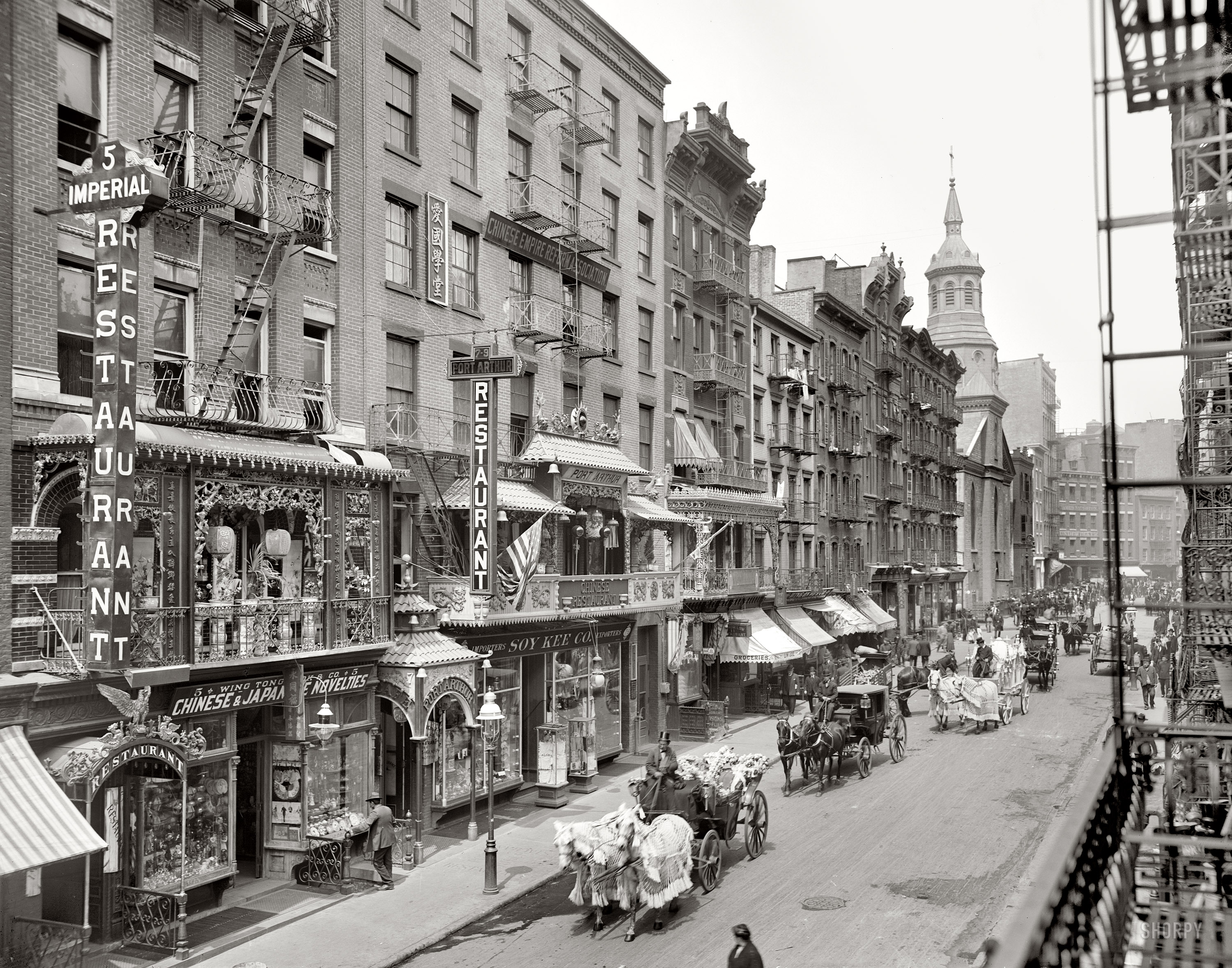 New York City circa 1905. "Funeral procession on Mott Street." 8x10 inch dry plate glass negative, Detroit Publishing Company. View full size.