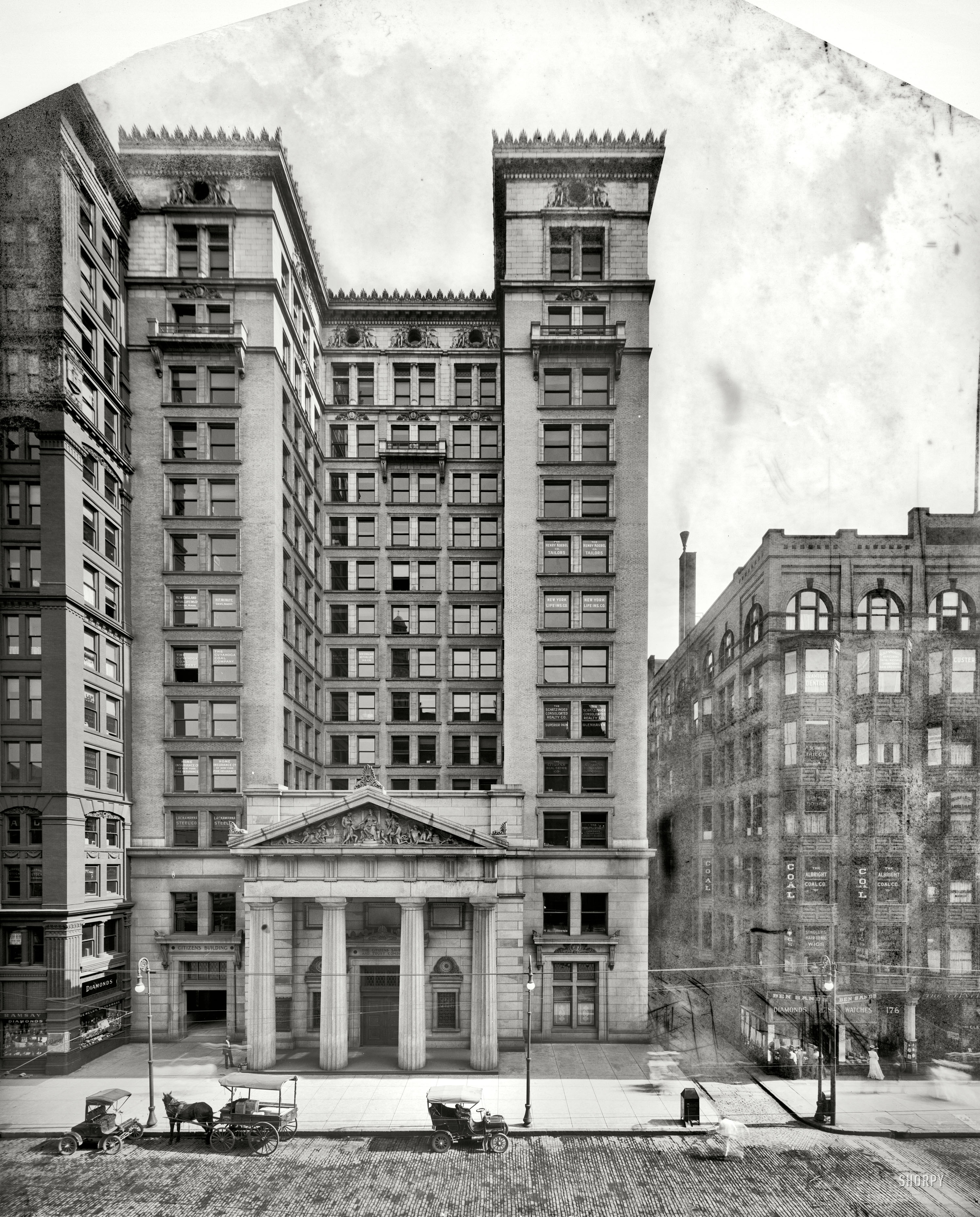 Cleveland, Ohio, circa 1905. "Citizens Savings and Trust Company building." Compared to the bulk of Detroit Publishing's glass negatives, this 8x10 plate has been heavily reworked, with the top corners masked out and buildings to either side subordinated under a layer of smudges and stipples. View full size.