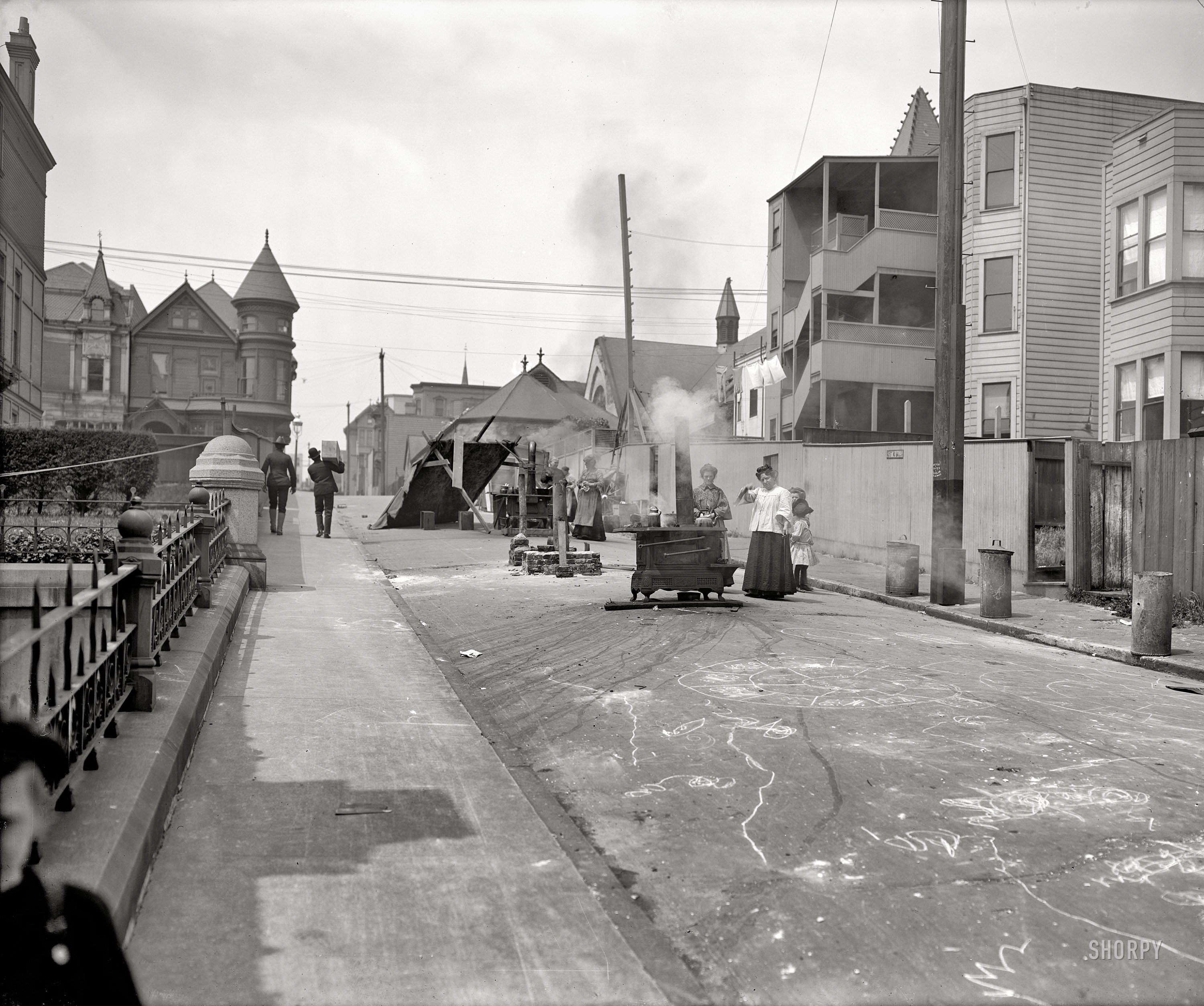 San Francisco, April 1906, after the earthquake and fire that leveled much of the city. "Cooking in the street." Detroit Publishing glass negative. View full size.