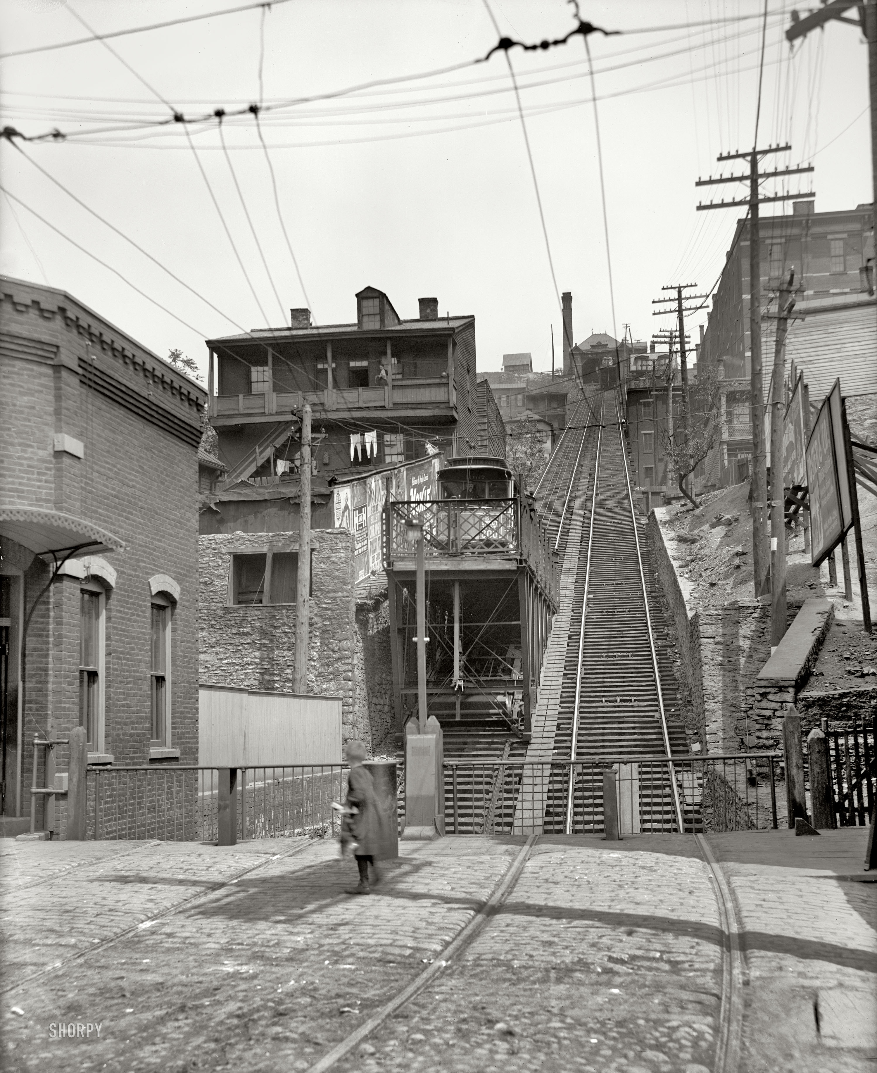 Cincinnati, Ohio, circa 1906. "Mount Adams incline." A closeup of one of Cincy's famous incline railway lines, and of a lesser-known clothesline. Also: Moxie! 8x10 inch dry plate glass negative, Detroit Publishing Company. View full size.