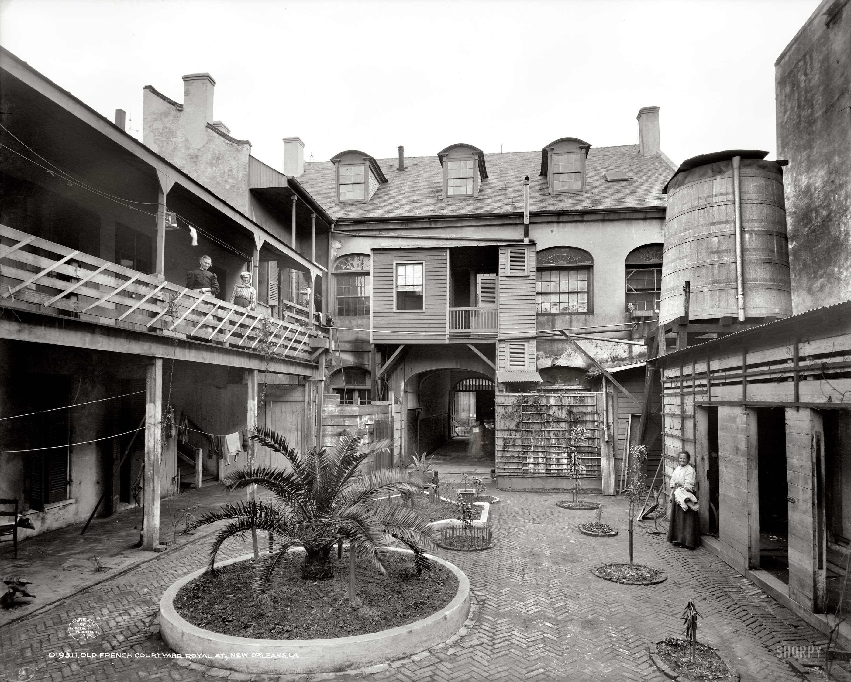 New Orleans, Louisiana, circa 1906. "Old French courtyard on Royal Street." 8x10 inch dry plate glass negative, Detroit Publishing Company. View full size.