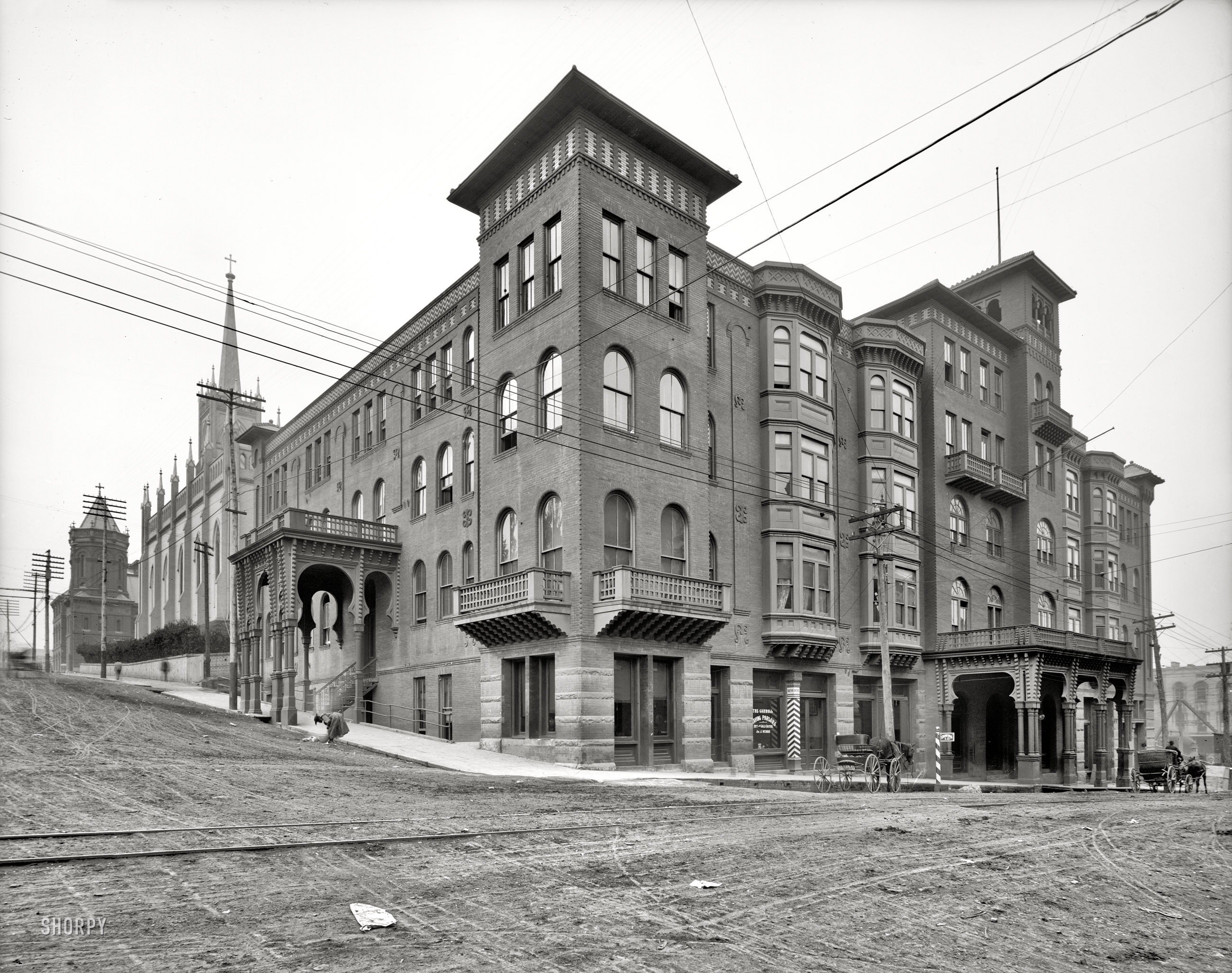 Vicksburg, Mississippi, circa 1906. "Carroll Hotel." Where the weary traveler will no doubt want to avail himself of the Shaving Parlors and Baths. View full size.