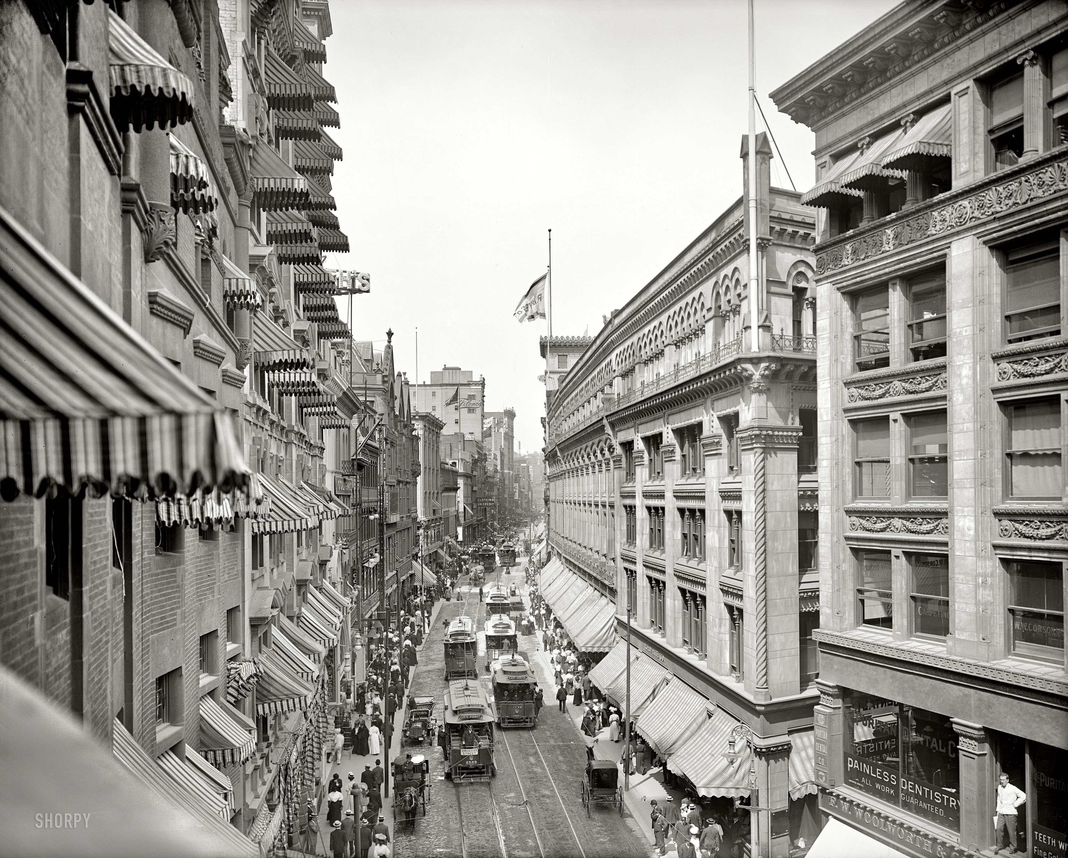 Boston, Massachusetts, circa 1906. "Washington Street." Or, "The Dentist Steps Out." 8x10 inch dry plate glass negative, Detroit Publishing Co. View full size.
