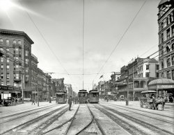 New Orleans, Louisiana, circa 1907. "Canal Street." Life on the grid a century ago. 8x10 inch dry plate glass negative, Detroit Publishing Company. View full size.
