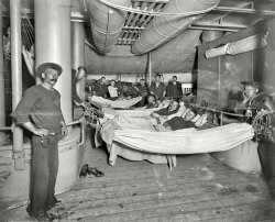 Continuing our tour of the U.S.S. Brooklyn circa 1897. "Hammocks on deck." Glass negative by Edward H. Hart, Detroit Publishing Company. View full size.
