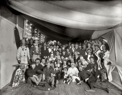 "A fancy dress ball." Sailors aboard the ill-fated U.S.S. Maine in 1896, two years before an explosion in Havana Harbor sank the battleship, killing most of the crew and precipitating the Spanish-American War. 8x10 inch dry plate glass negative by Edward H. Hart, Detroit Publishing Company. View full size.