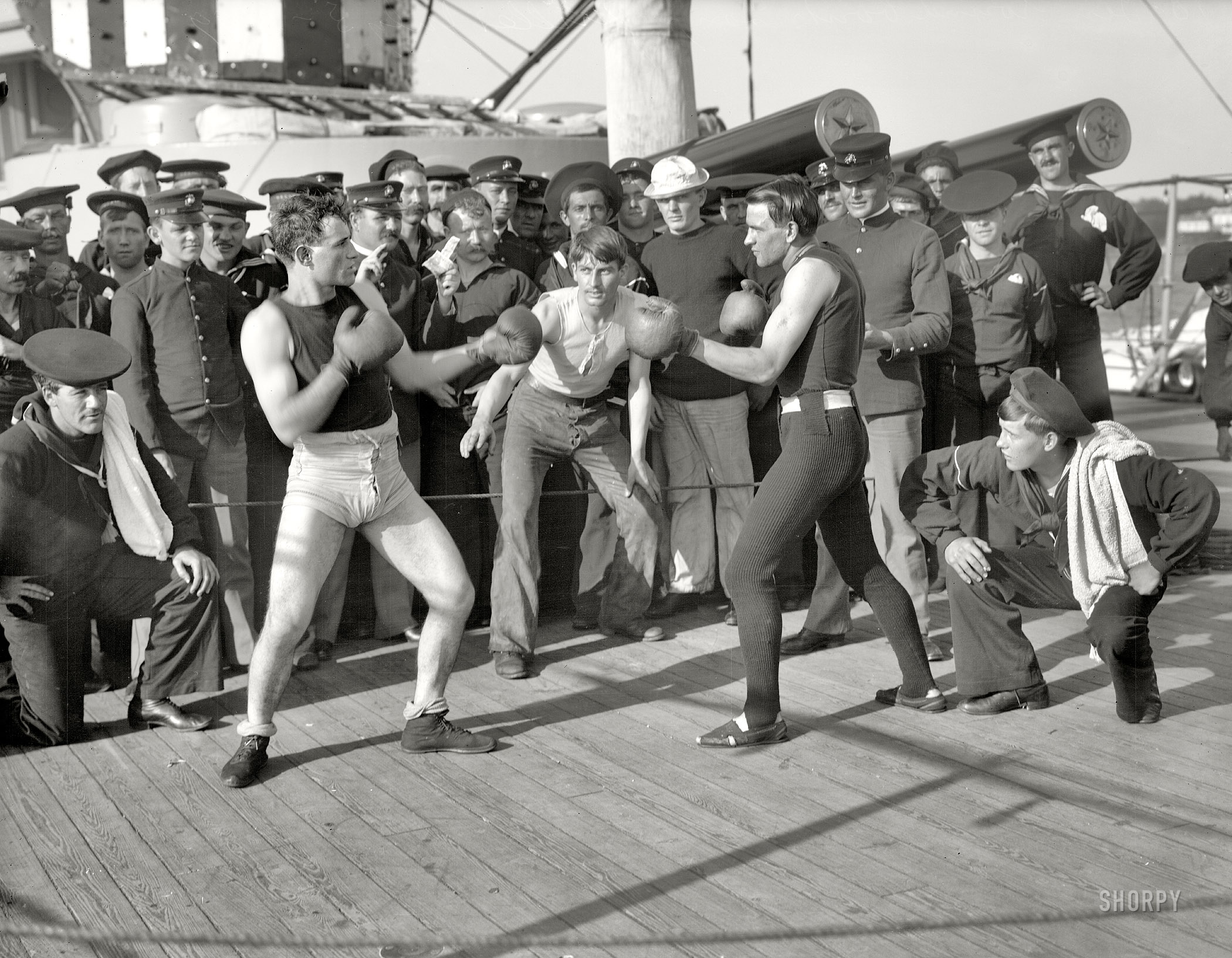 July 3, 1899, aboard the U.S.S. New York. "A 10-round bout, anniversary of Santiago." Photo by Edward H. Hart, Detroit Publishing Co. View full size.