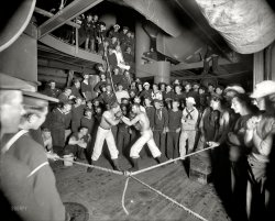 Aboard the warship U.S.S. Oregon circa 1897. "Second round." Our third look at this nighttime boxing match. 8x10 glass negative by E.H. Hart. View full size.