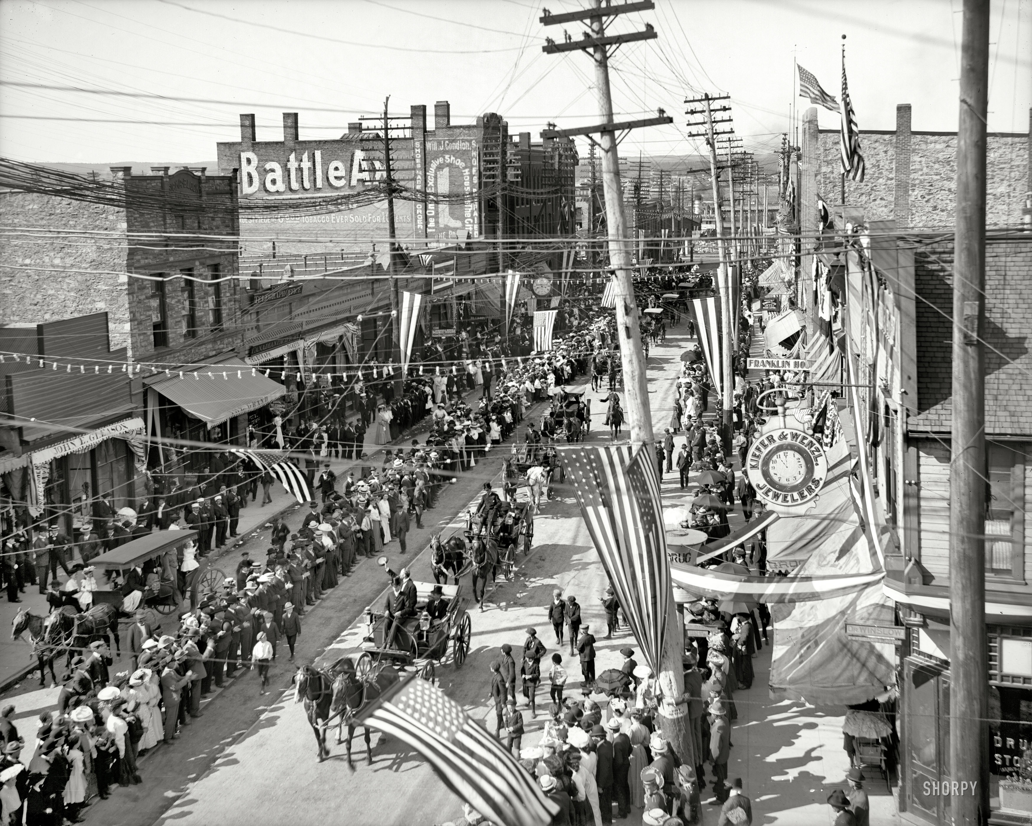 Sault Sainte Marie, Michigan, circa 1905. "St. Mary's Canal celebration, parade on Ashmun Street." 8x10 glass negative, Detroit Publishing Co. View full size.