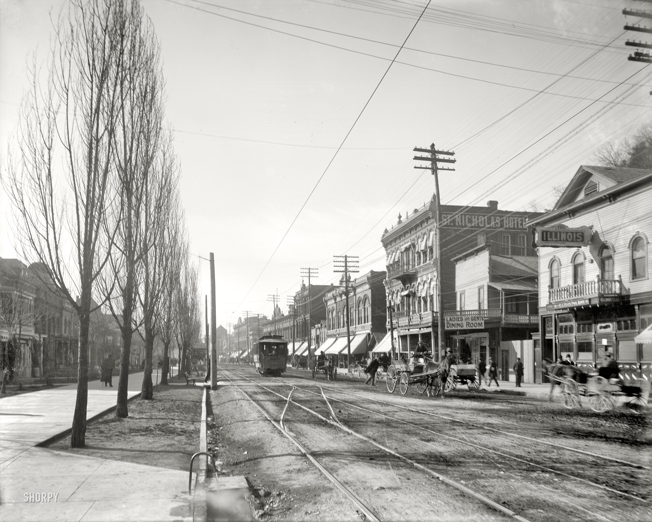 Circa 1900. "Central Avenue, Hot Springs, Arkansas." Note the flowing tap in the foreground. 8x10 inch glass negative, Detroit Publishing Co. View full size.