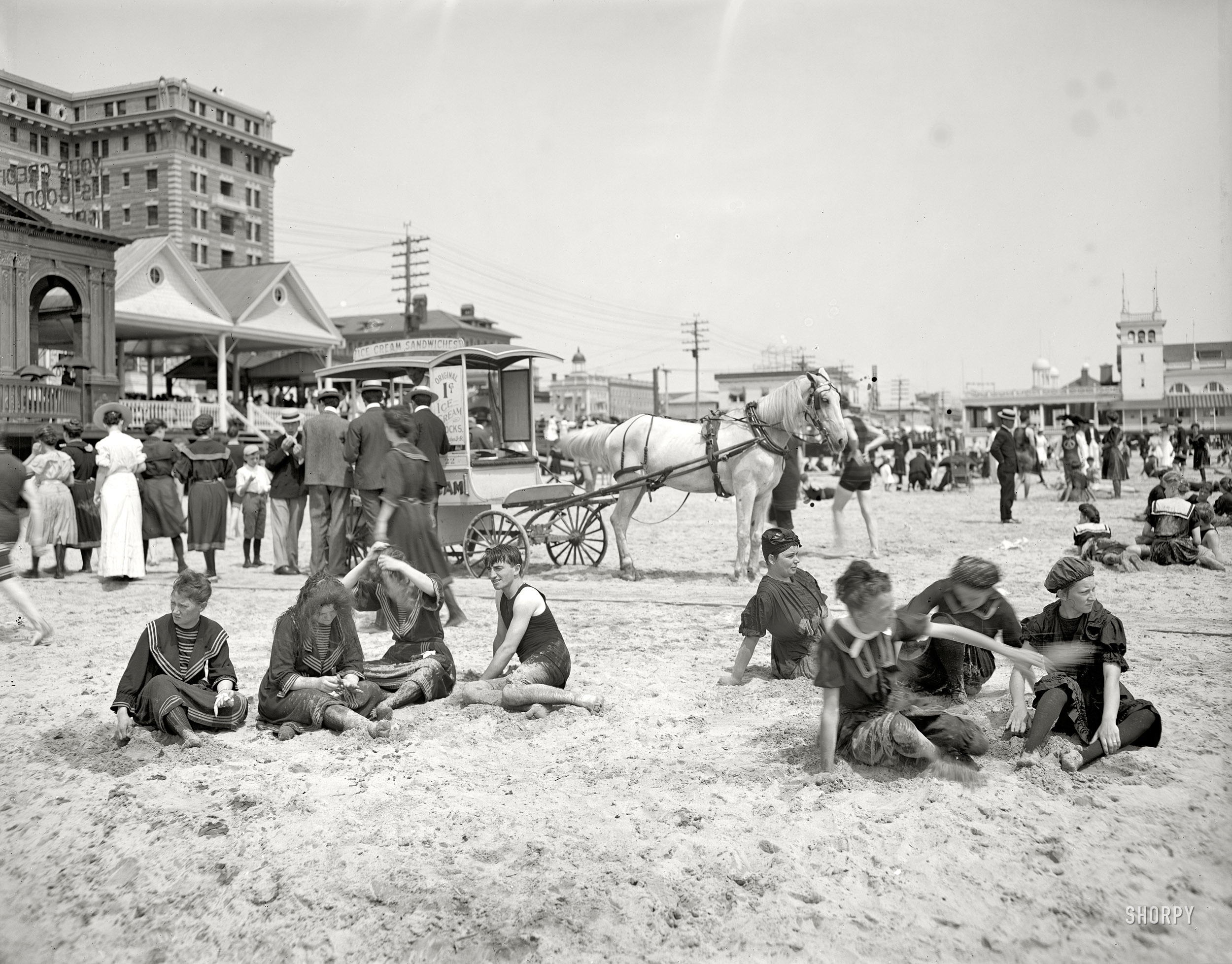 The Jersey Shore circa 1905. "On the beach, Atlantic City." Who has the Frisbee? 8x10 inch dry plate glass negative, Detroit Publishing Company. View full size.