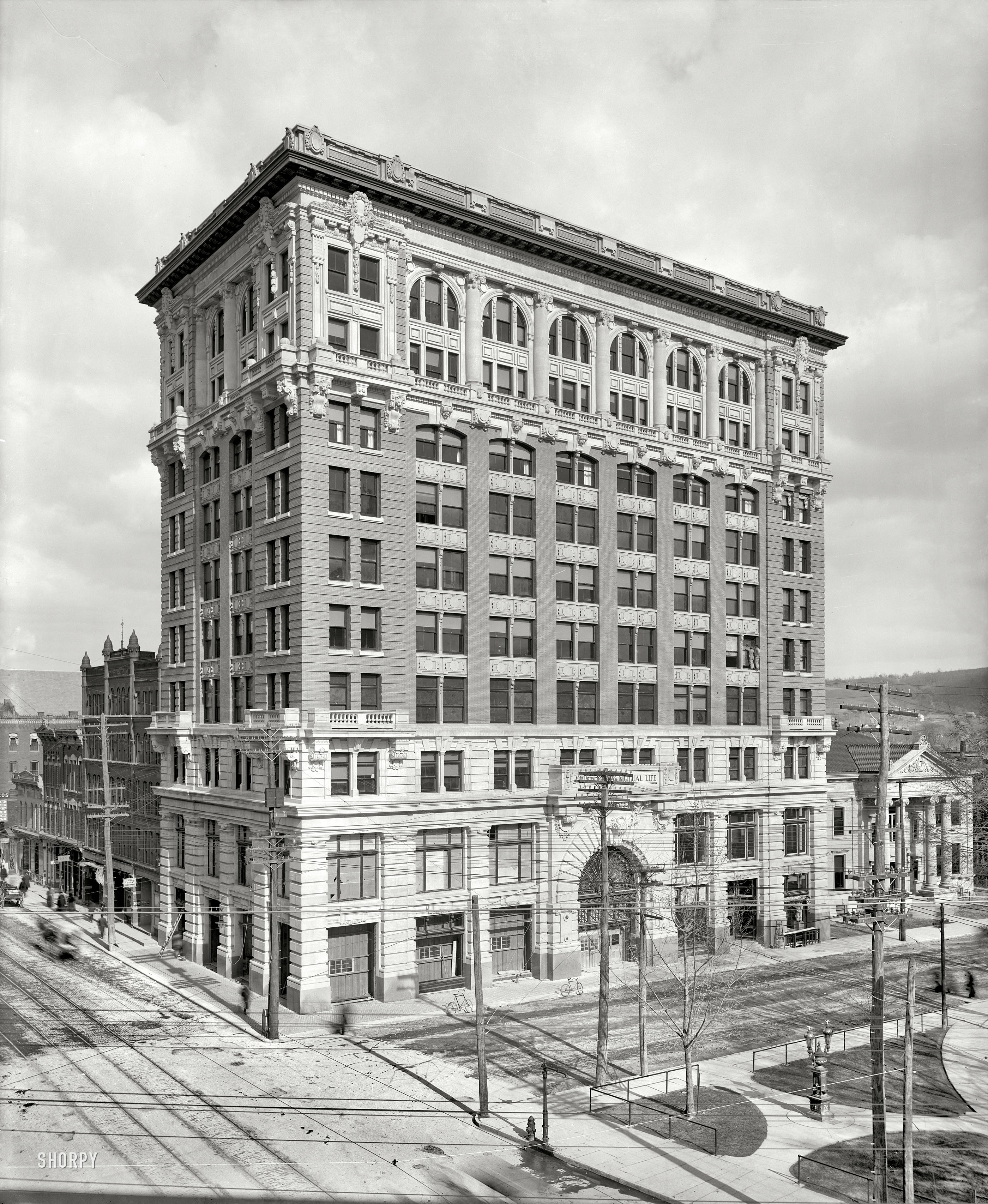 Binghamton, New York, circa 1905. "Security Mutual Life Insurance building." Rising amid a web of wires. Detroit Publishing glass negative. View full size.
