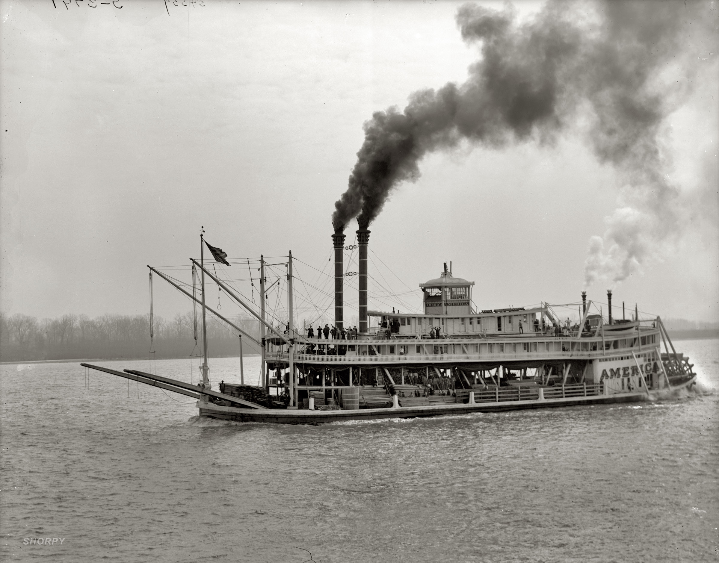 "America, Mississippi riverboat, circa 1900-1910." Note the group of convicts in prison stripes. Detroit Publishing Company glass negative. View full size.