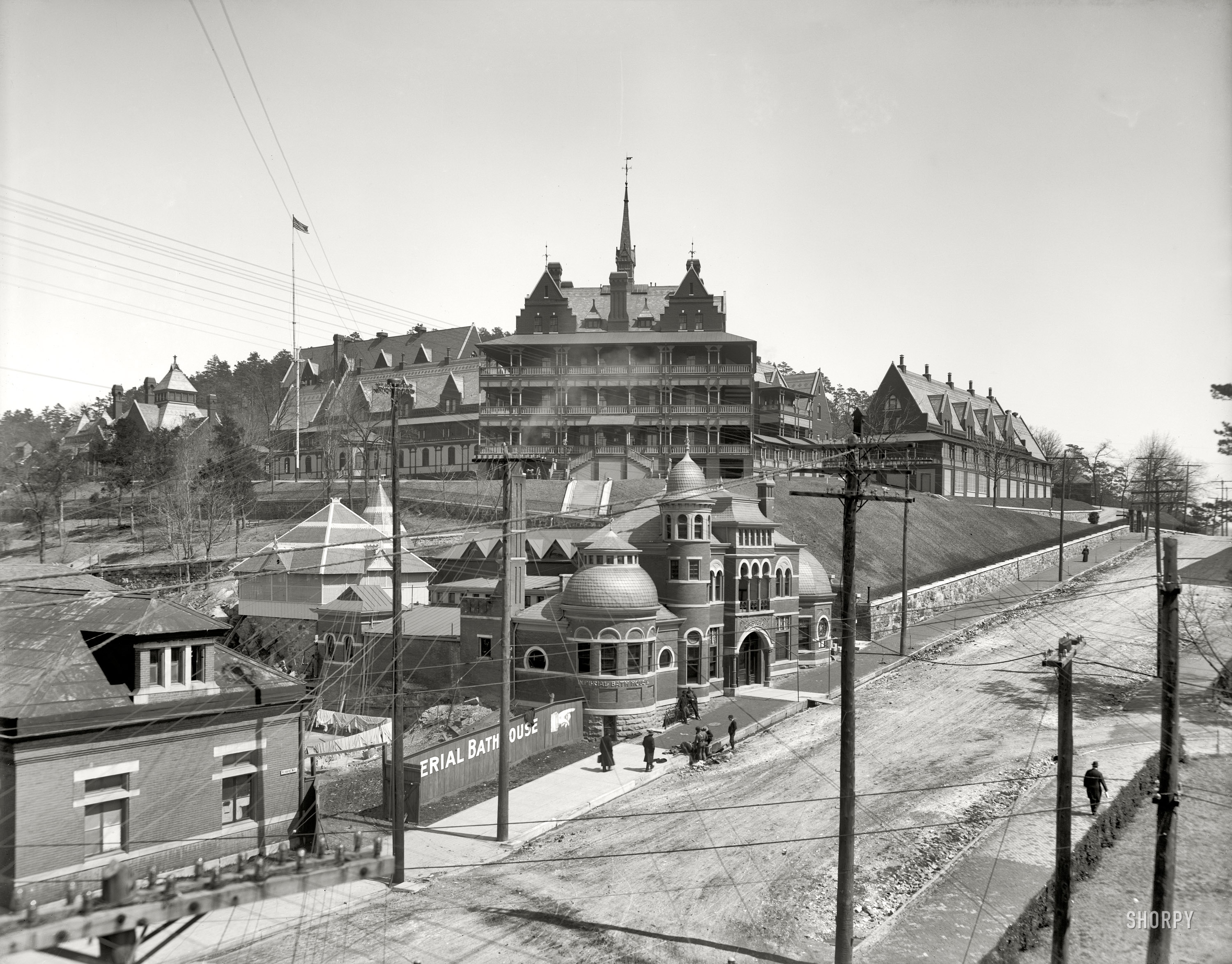 Hot Springs, Arkansas, circa 1908. "Army and Navy General Hospital." Closer to the camera on Reserve Avenue we have the Imperial Bath House and some helpful signage. 8x10 inch glass negative, Detroit Publishing Company. View full size.